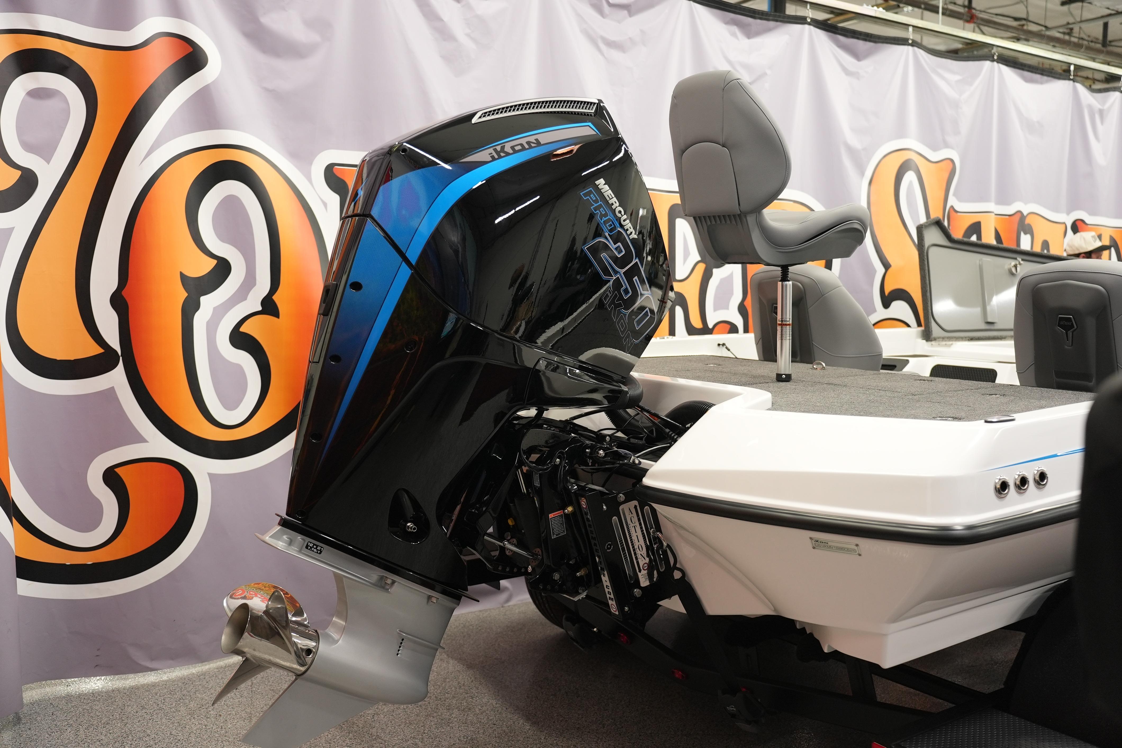 iKon VLE21 2026 boat with Mercury Pro XS engine displayed indoors.