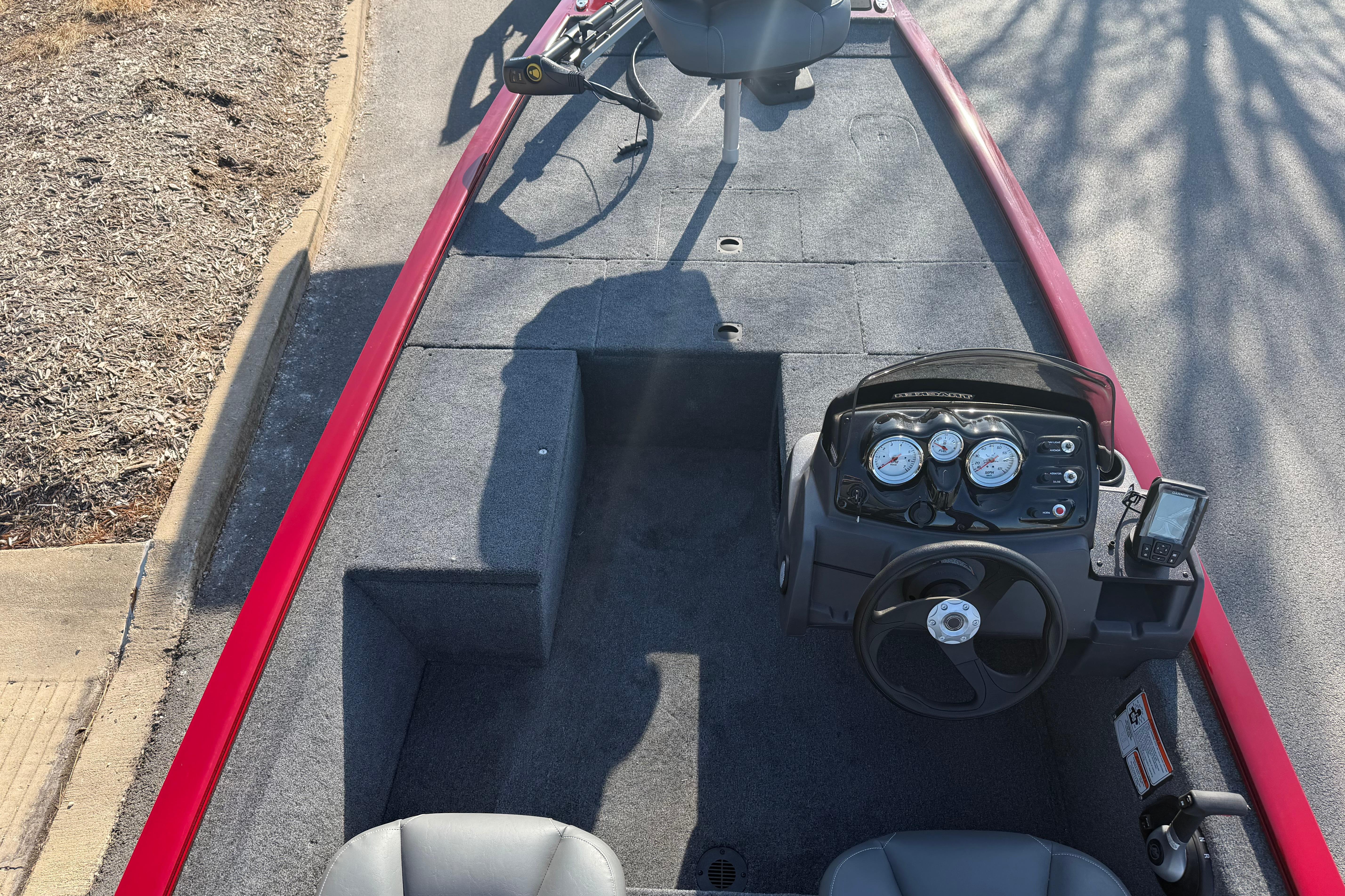 2026 Tracker Pro 170 boat interior with steering console and seating.