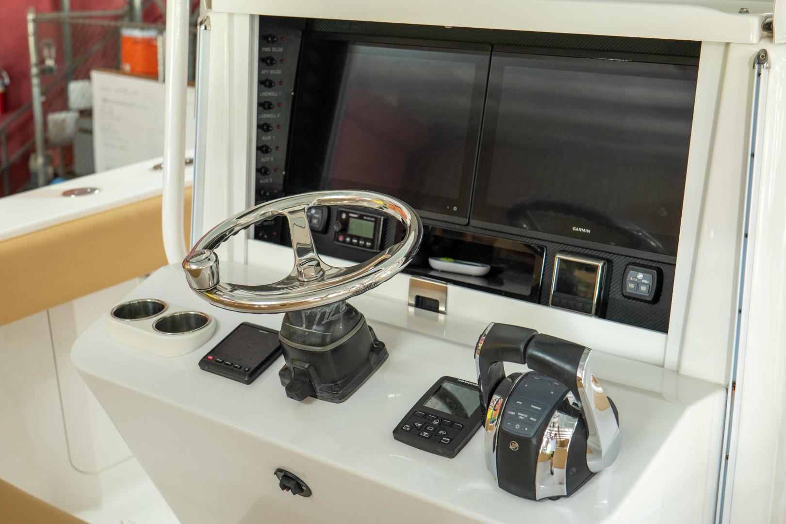 2020 Bahama 41 Open Fisherman boat helm with modern controls and dual screens.