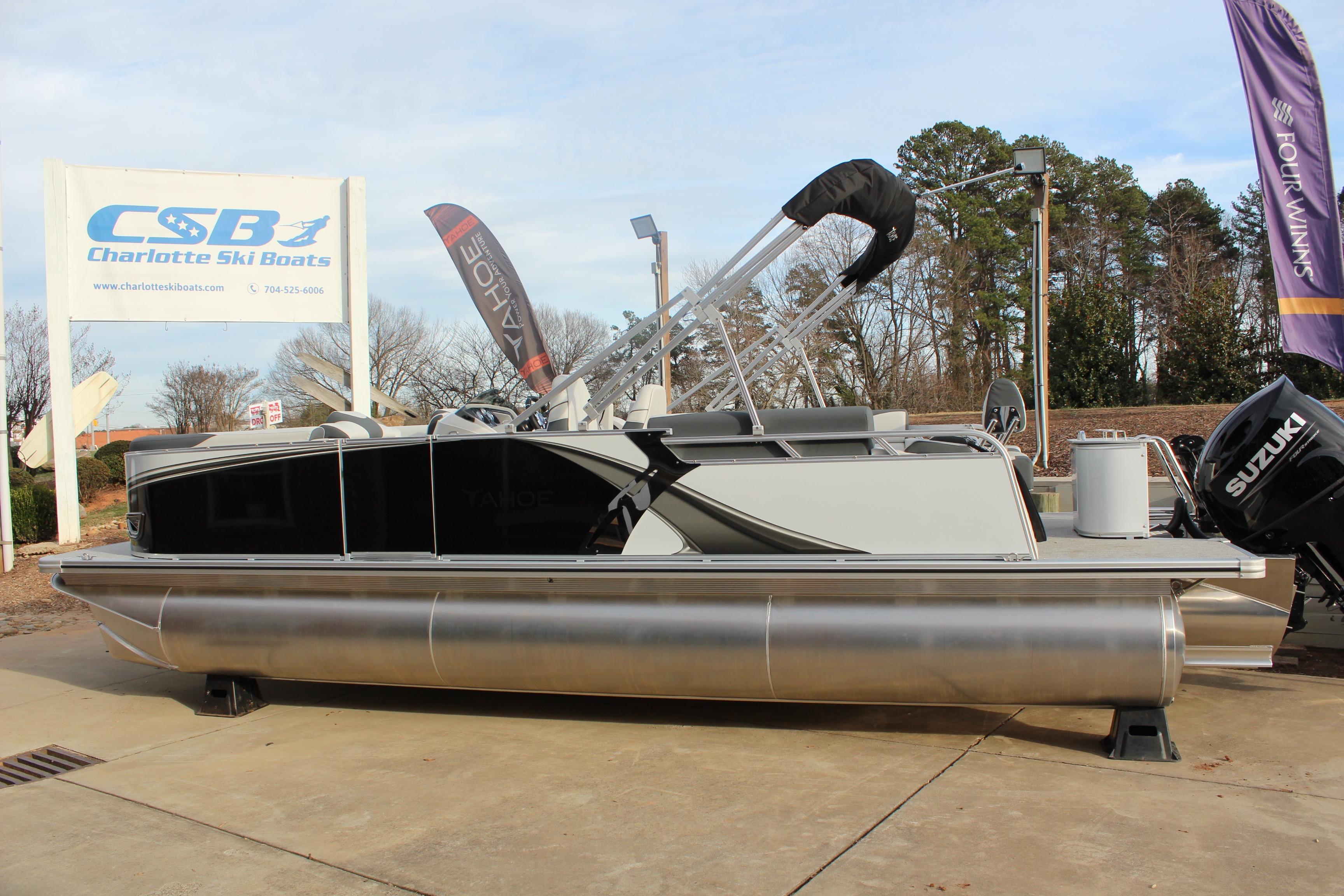 2026 Tahoe Pontoon LTZ boat displayed at Charlotte Ski Boats dealership.