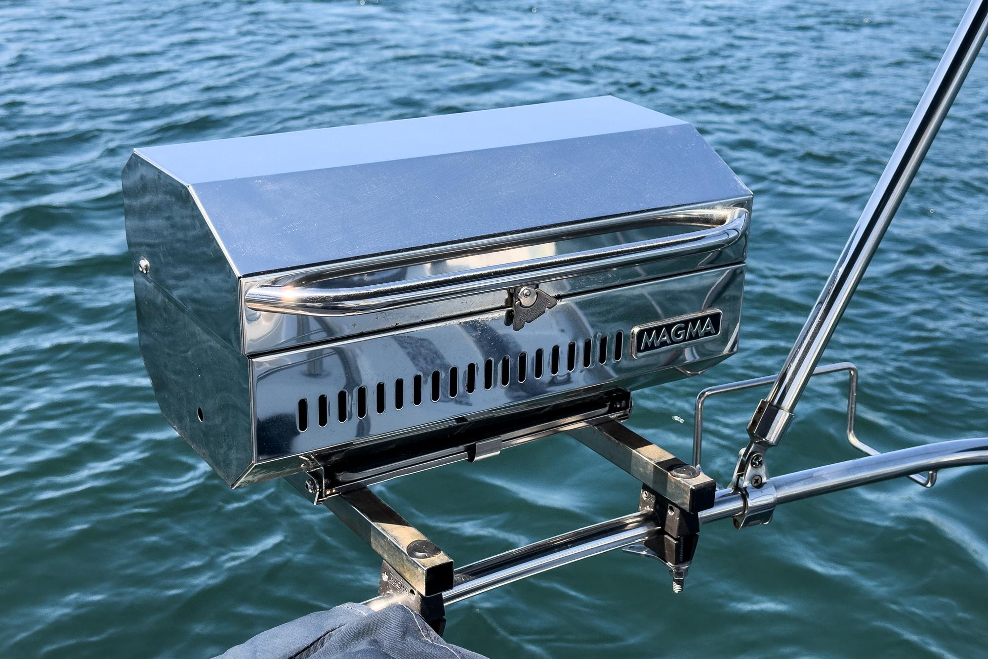 Stainless steel Magma grill mounted on Jeanneau Sun Odyssey 43 sailboat, 2002 model.