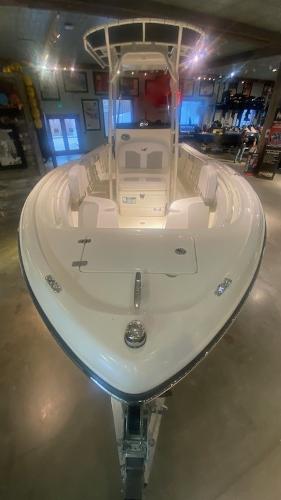 2024 Mako 214 CC center console boat displayed indoors.