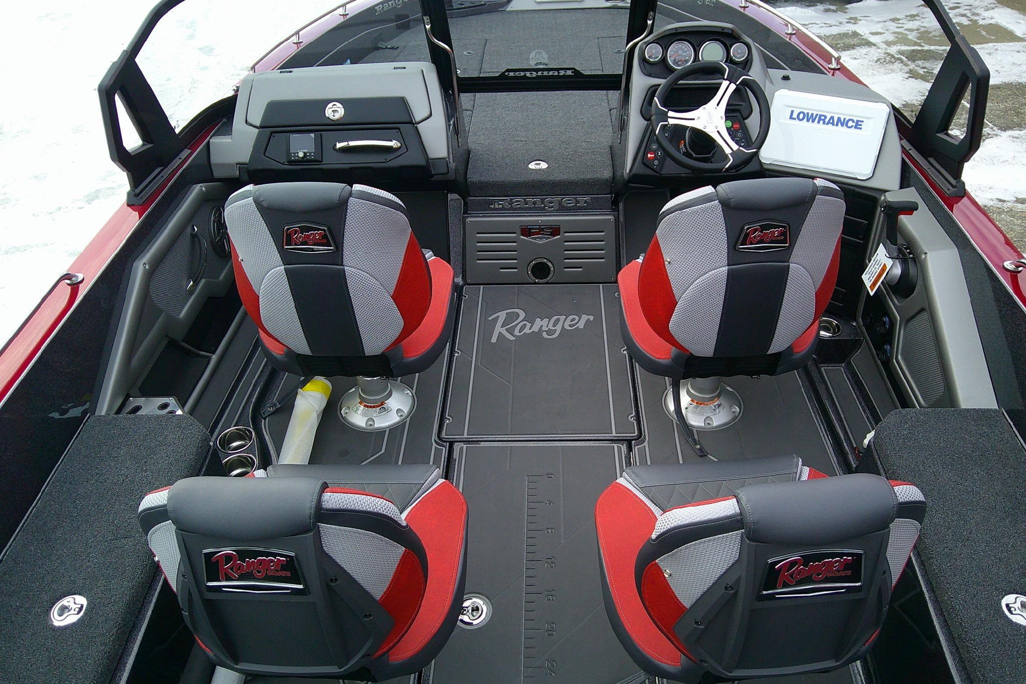 2026 Ranger 620FS Cup Equipped boat interior with red and gray seating, steering console, and Lowrance display.