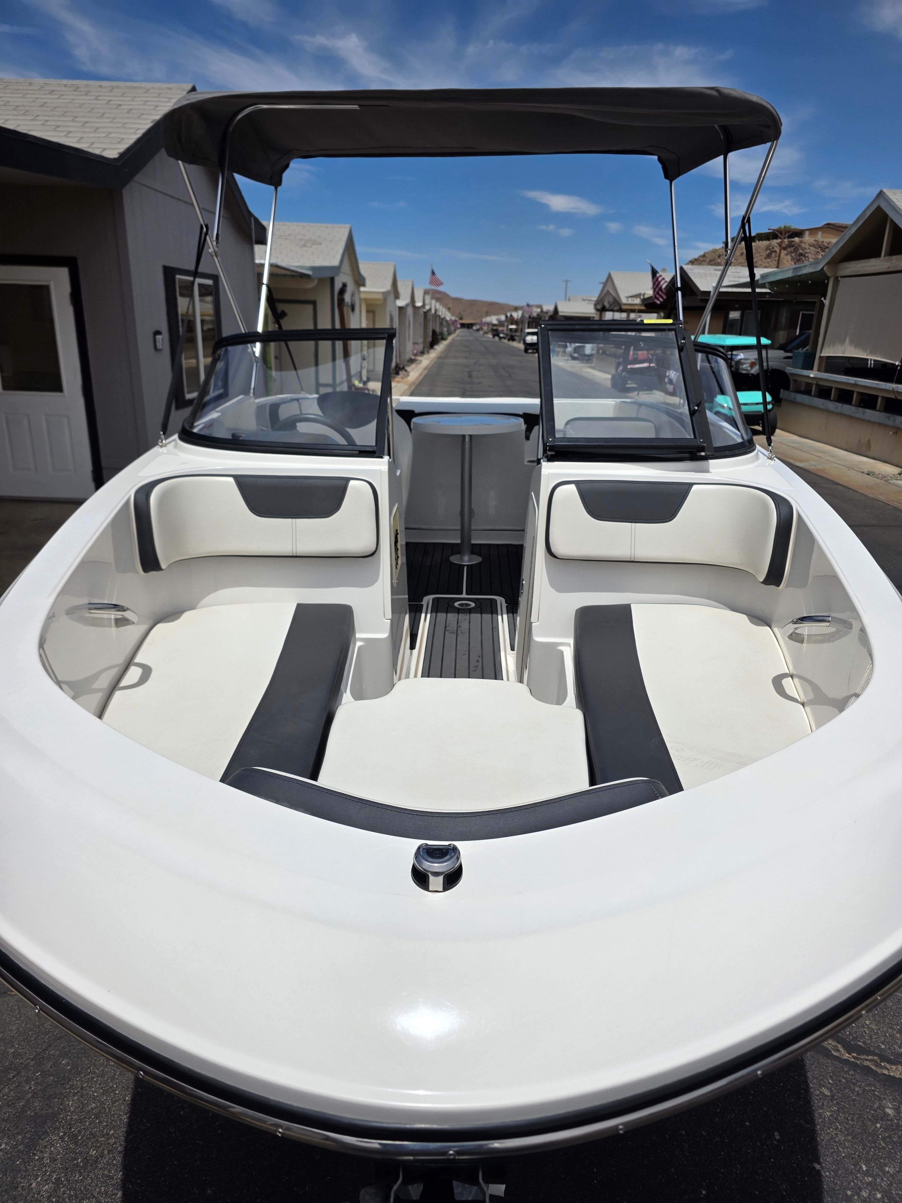 A 2021 Bayliner VR4 Bowrider I/O with an open bow area and cushioned seating.