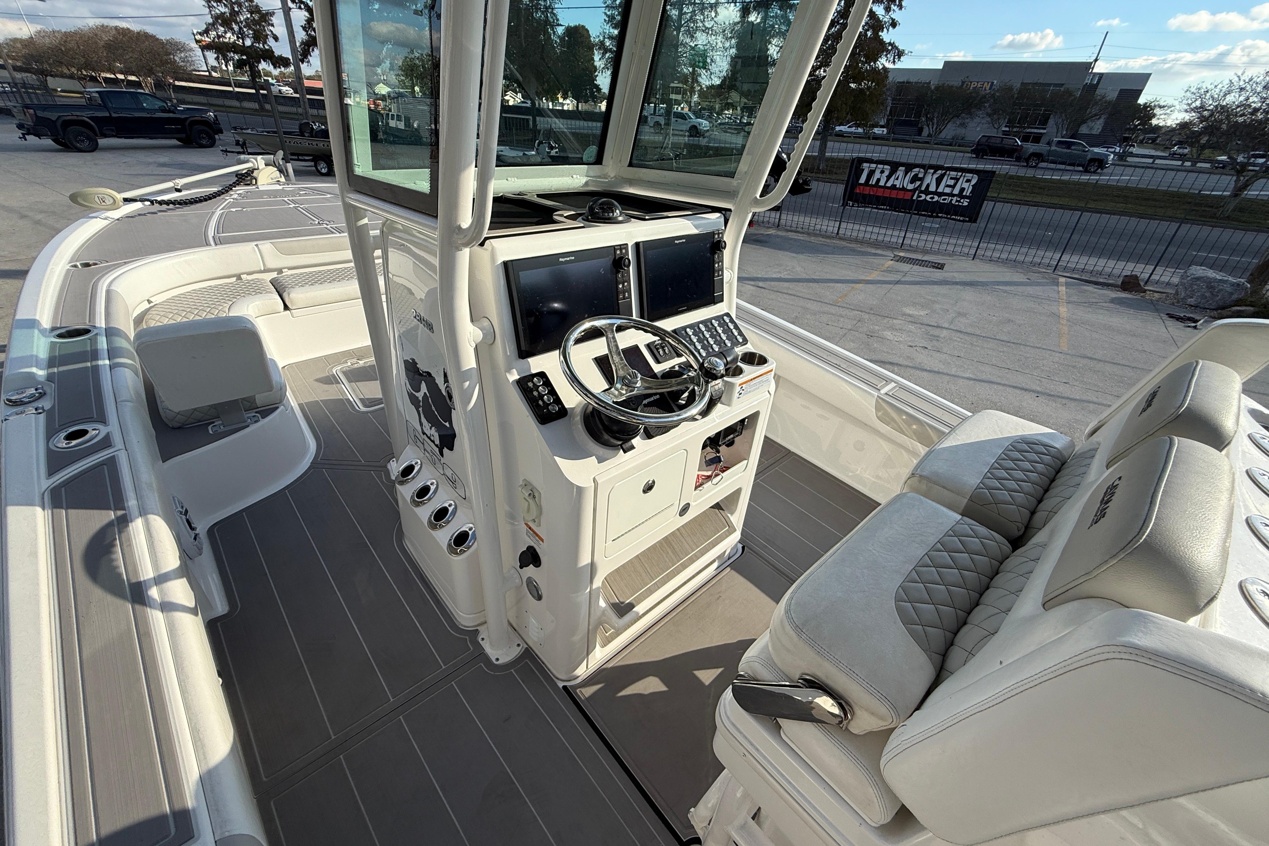 2022 Caymas 28 HB Twin boat interior with modern controls and seating.