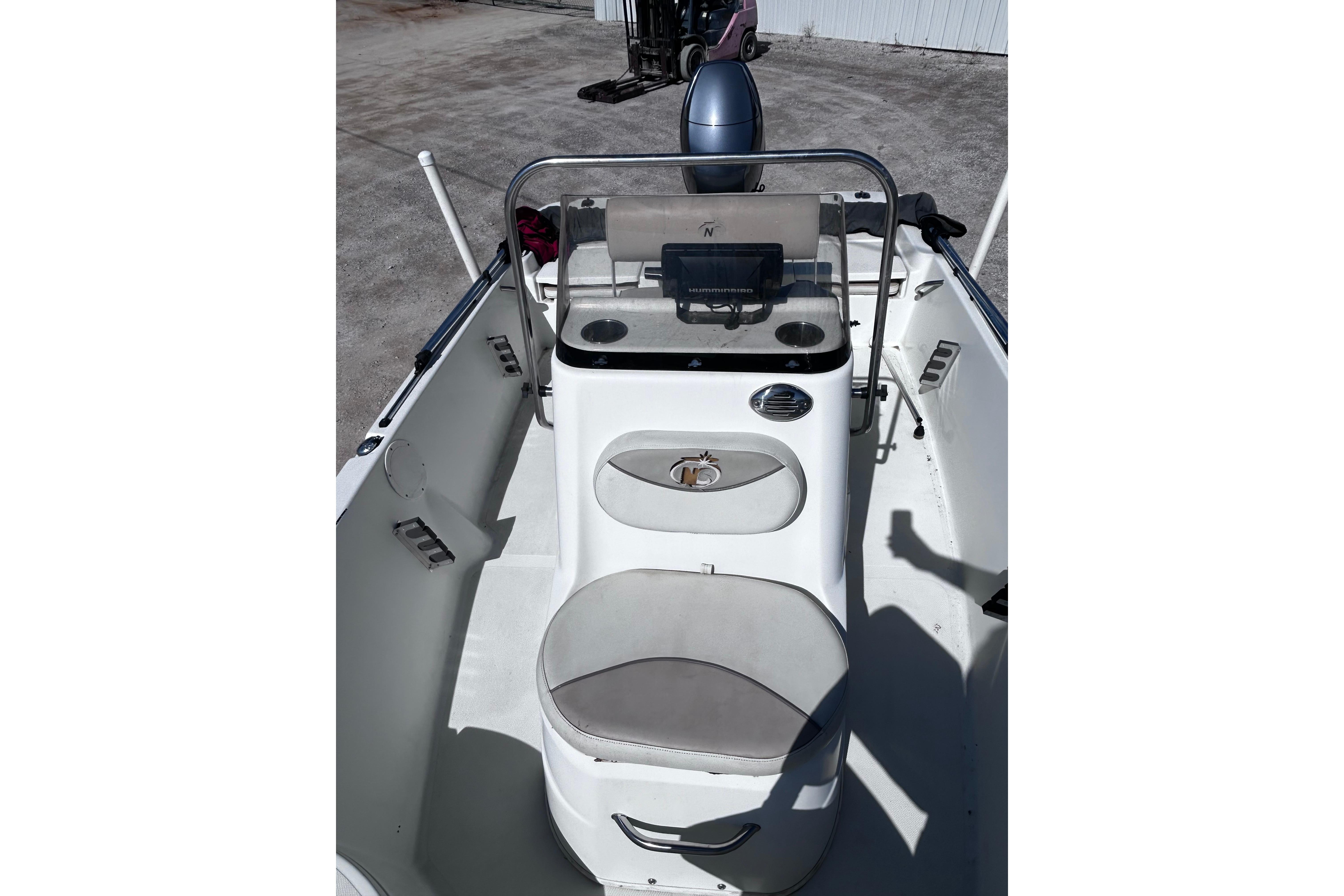 2016 NauticStar 1810 NauticBay boat interior with console and seating.