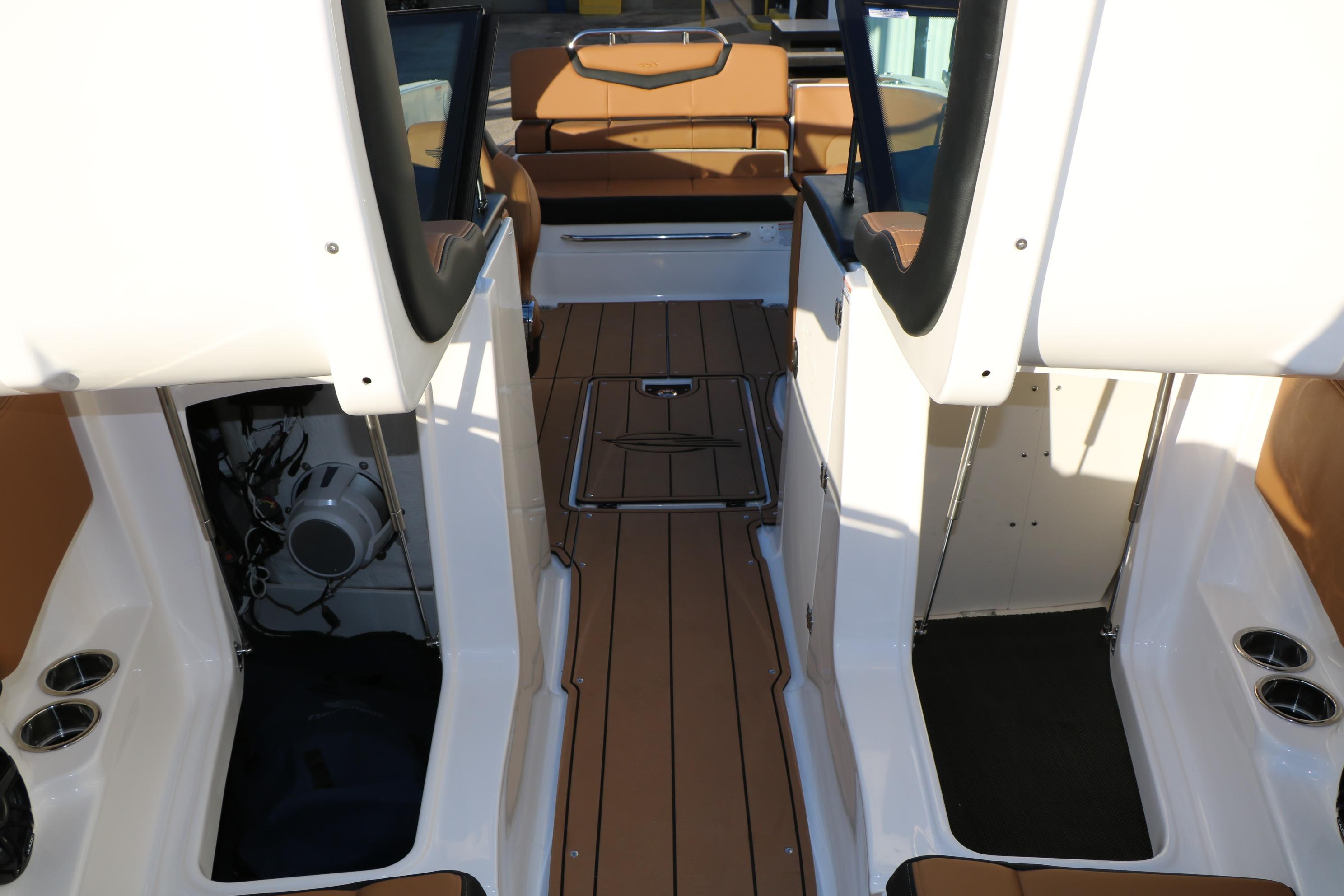 2026 Chaparral 247 SSX boat interior with tan seating and sleek design.