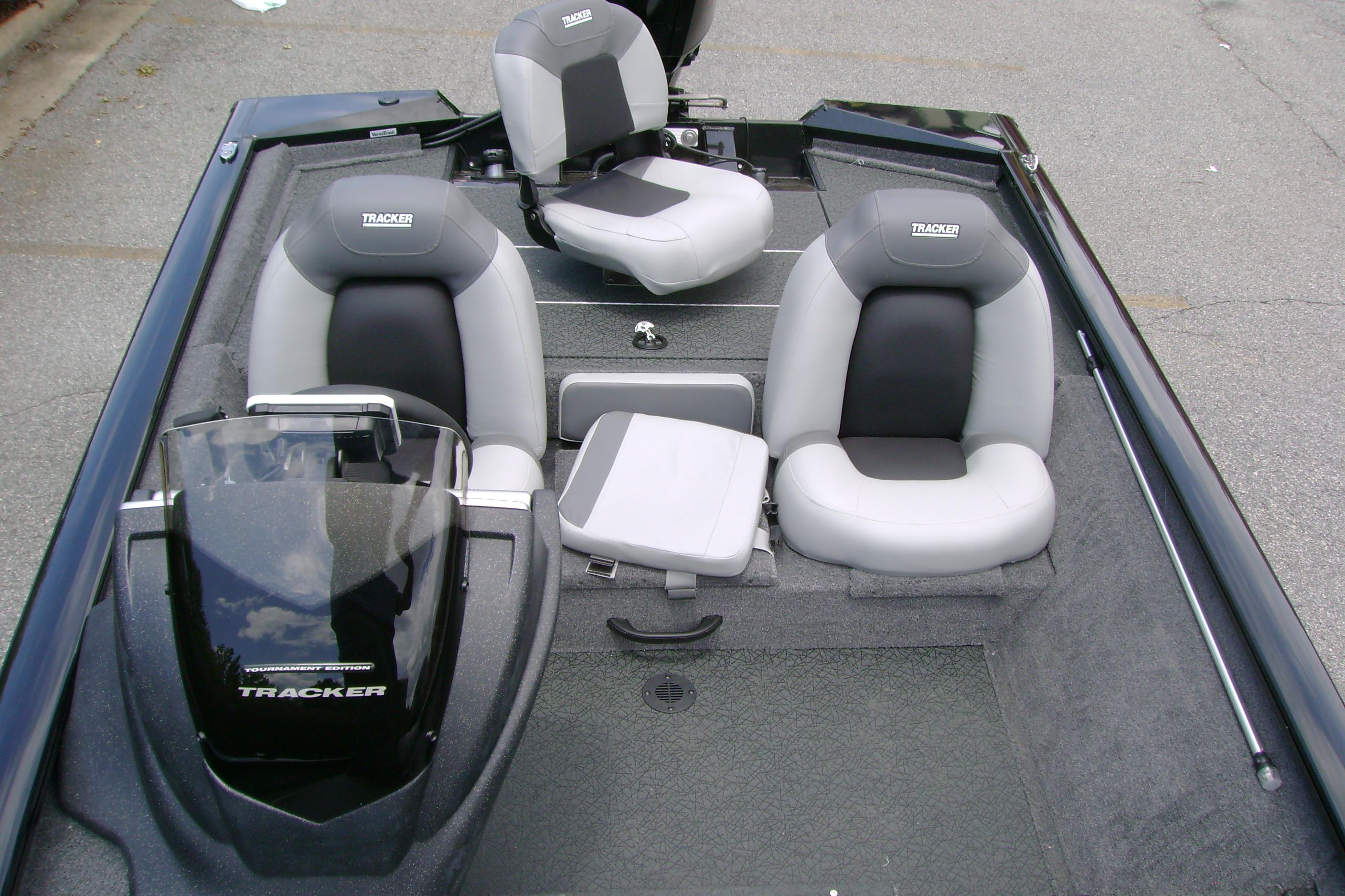 2026 Tracker Pro Team 175 boat interior with three cushioned seats and sleek design.