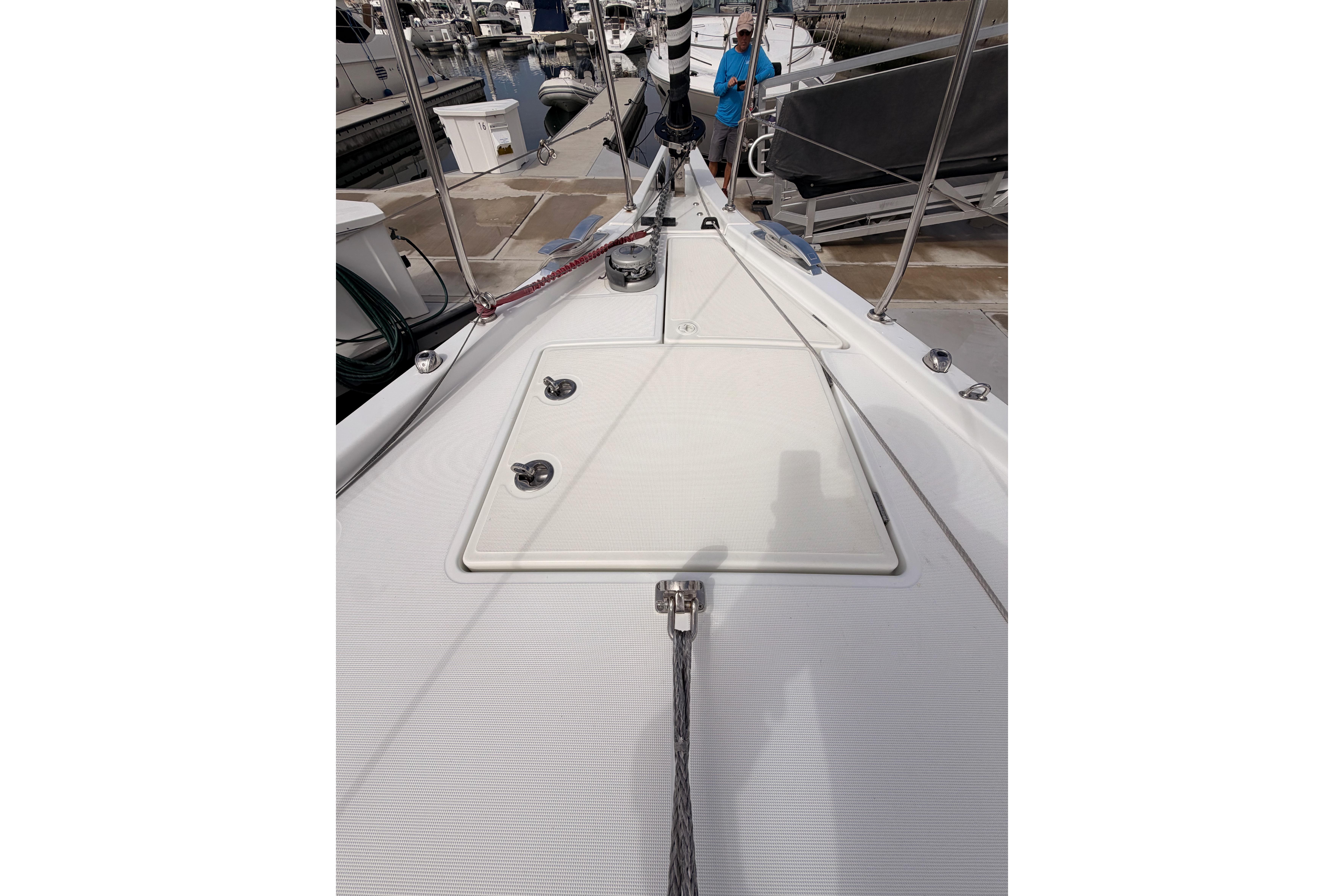 Deck view of a 2020 Beneteau Oceanis 46.1 sailboat in a marina setting.