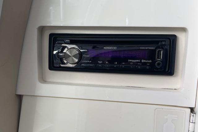 Kenwood stereo system in 1999 Formula 400 Super Sport boat dashboard.