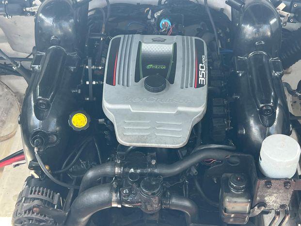 Engine of a 2011 Sea Ray 300 Sundeck boat, featuring a 350 MAG motor.