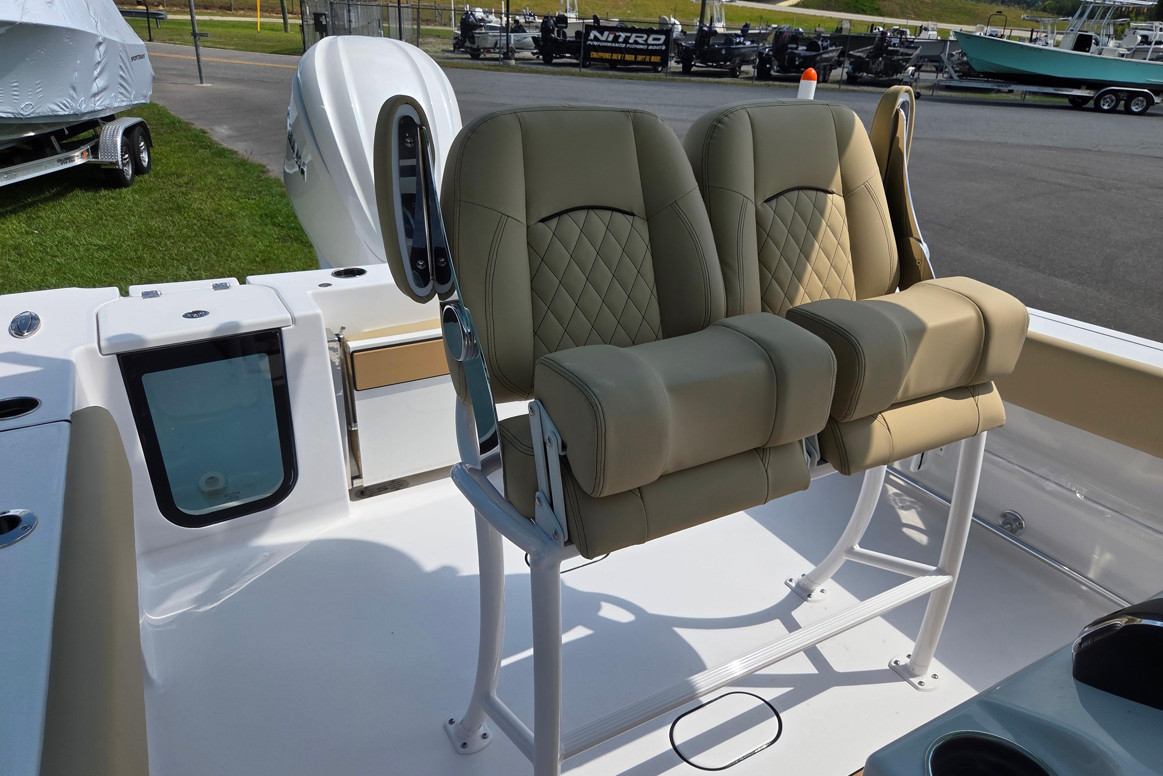 2026 Sportsman Open 232 Center Console boat with dual cushioned seats and modern design.
