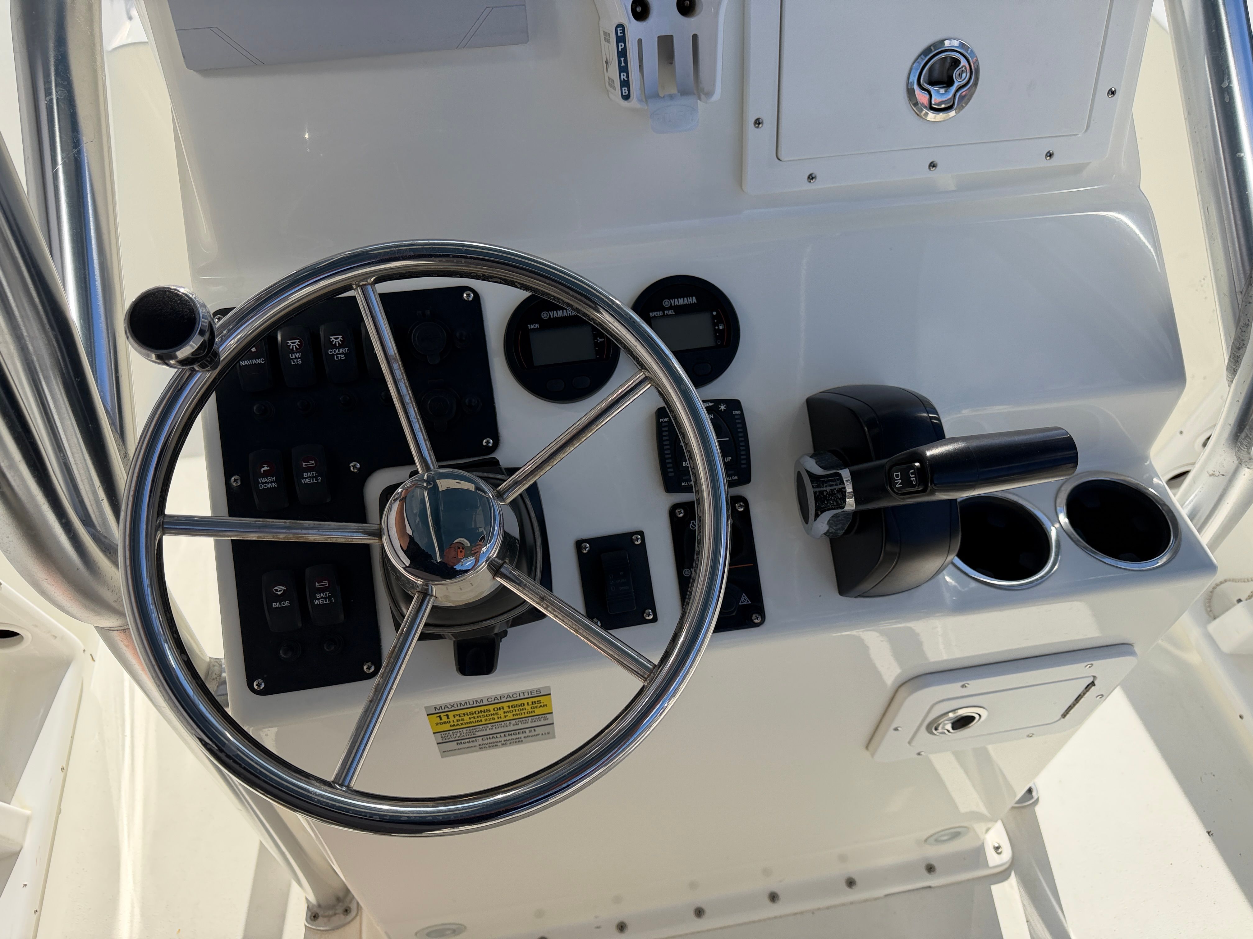 Steering console of a 2021 KenCraft Challenger boat.