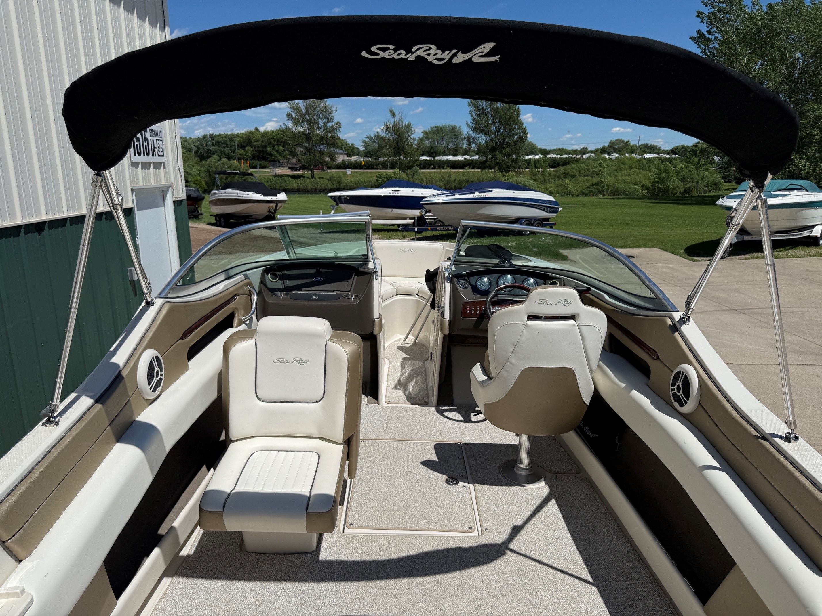 Interior of a 2007 Sea Ray 230 Select boat with seating.