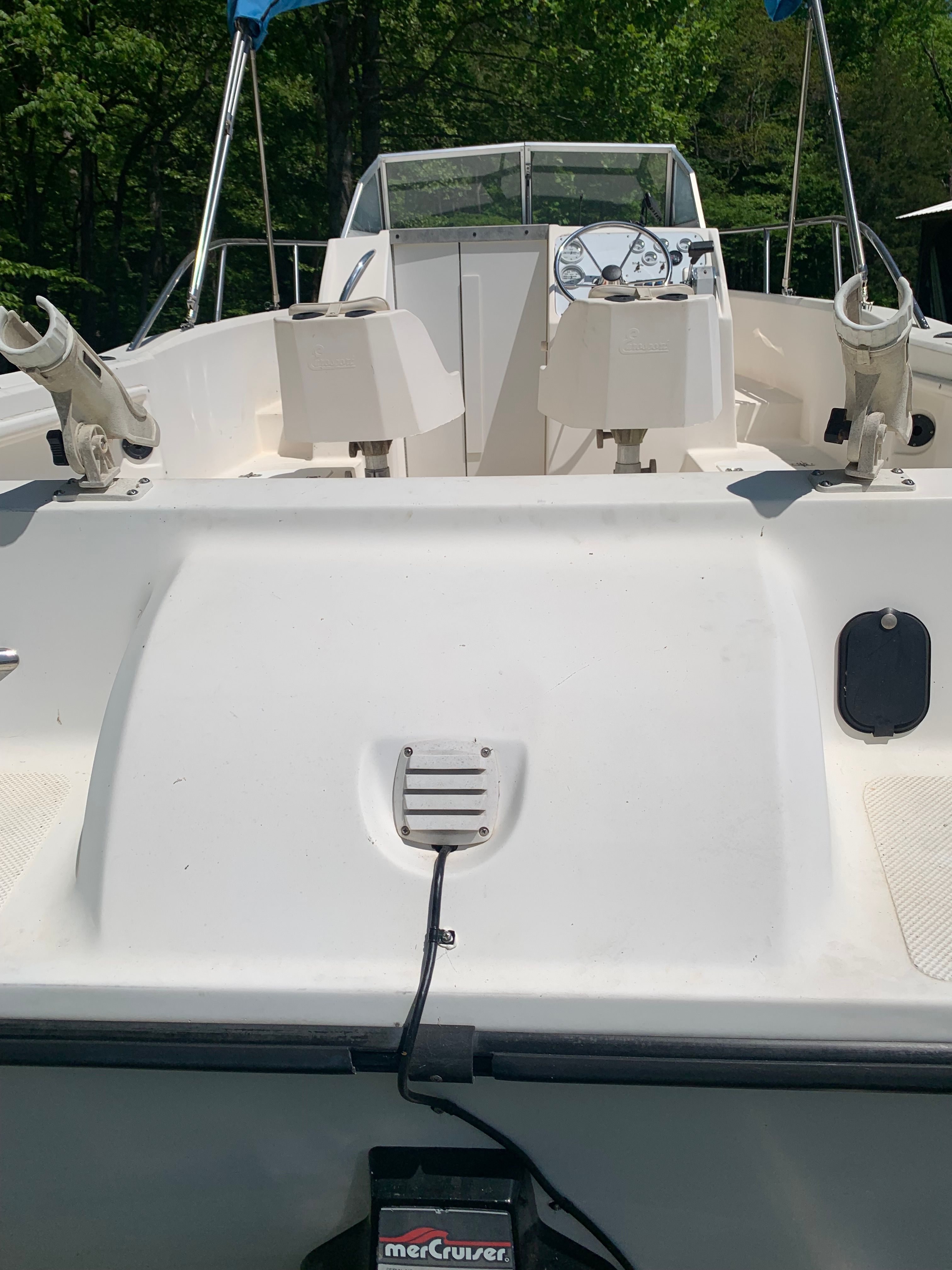 1998 Eurosport 221WA boat with steering console and MerCruiser engine.