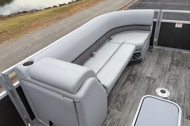 2025 Ranger Reata 243C pontoon boat with sleek seating and modern design.
