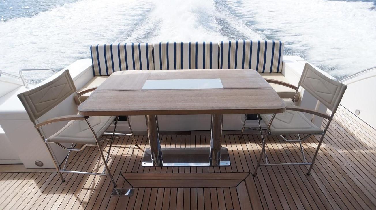 Luxury deck seating on 2012 Fairline Squadron 65 yacht with ocean view.