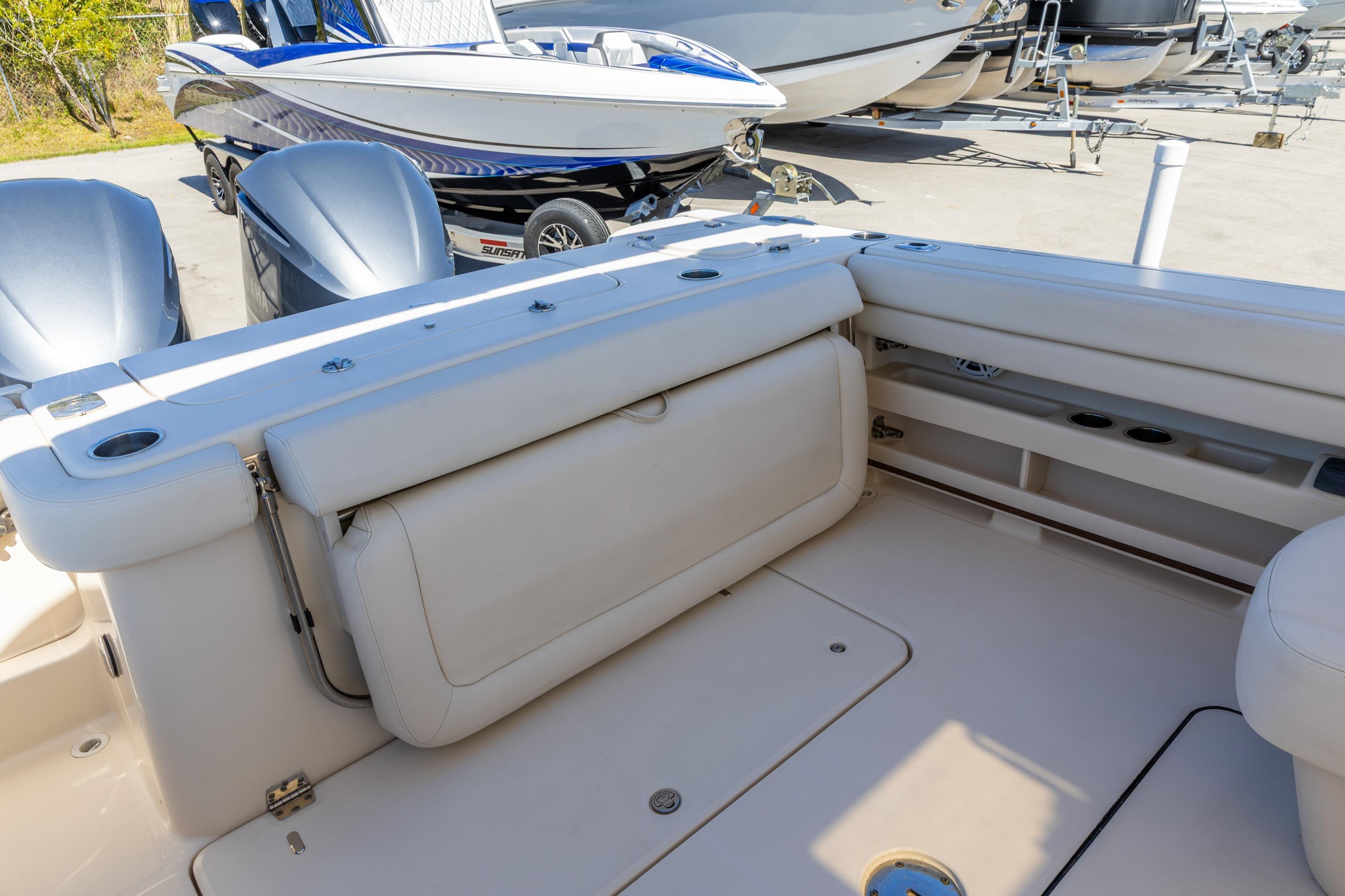 2016 Grady-White Freedom 307 boat interior with seating and dual outboard motors.