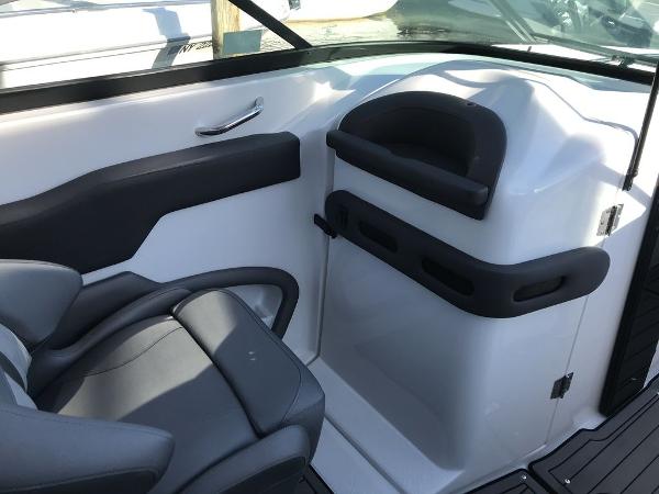 2020 Rinker 29QX BR boat interior with gray seating and sleek design.