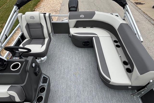 2026 Sun Tracker Bass Buggy 16 XL Select pontoon boat interior with seating and console.