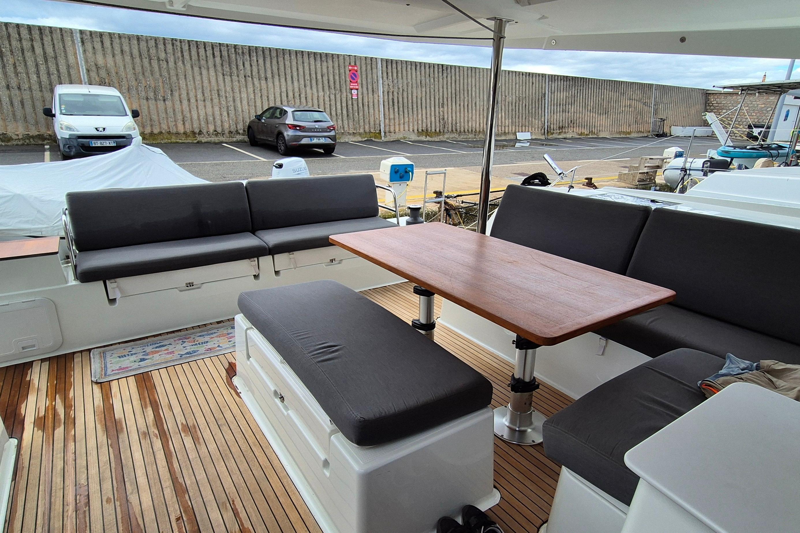 Spacious deck seating area on 2021 Fountaine Pajot Saona 47 catamaran.