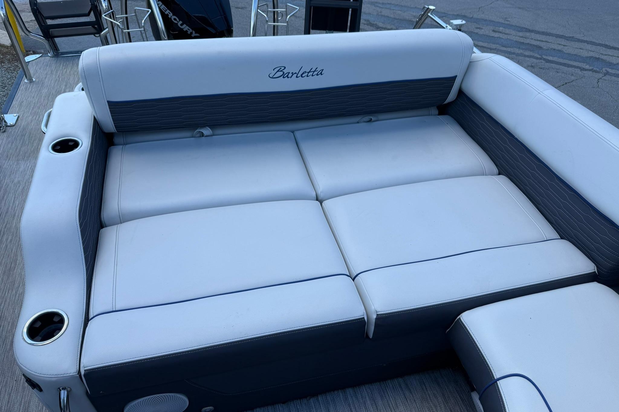 2023 Barletta Corsa 23U boat seating with cup holders and sleek design.