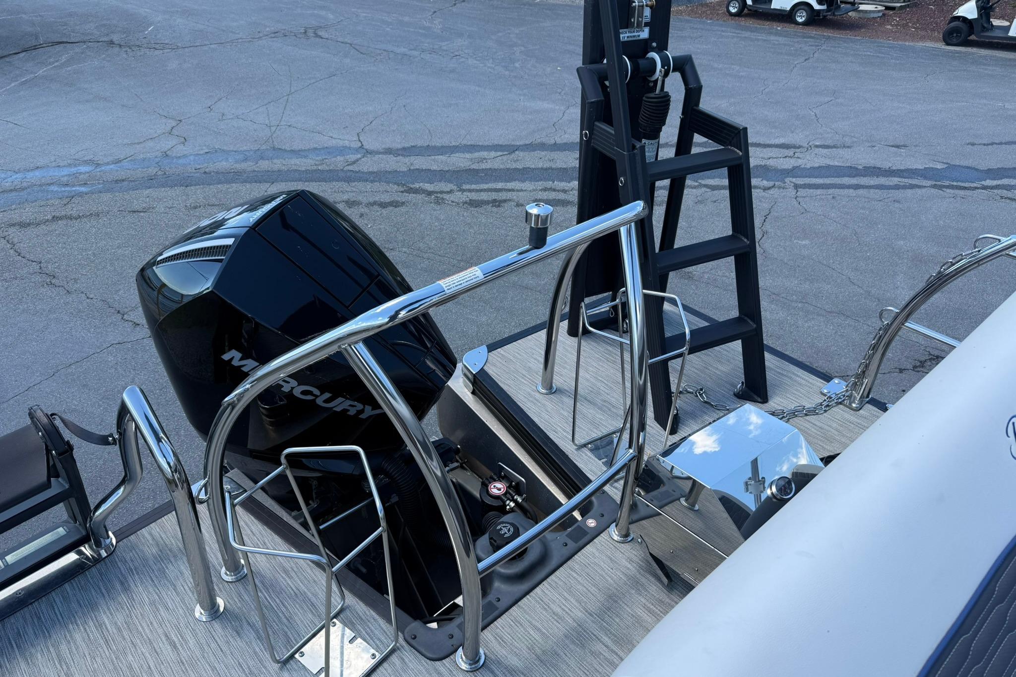 2023 Barletta Corsa 23U boat with Mercury engine and sleek deck design.