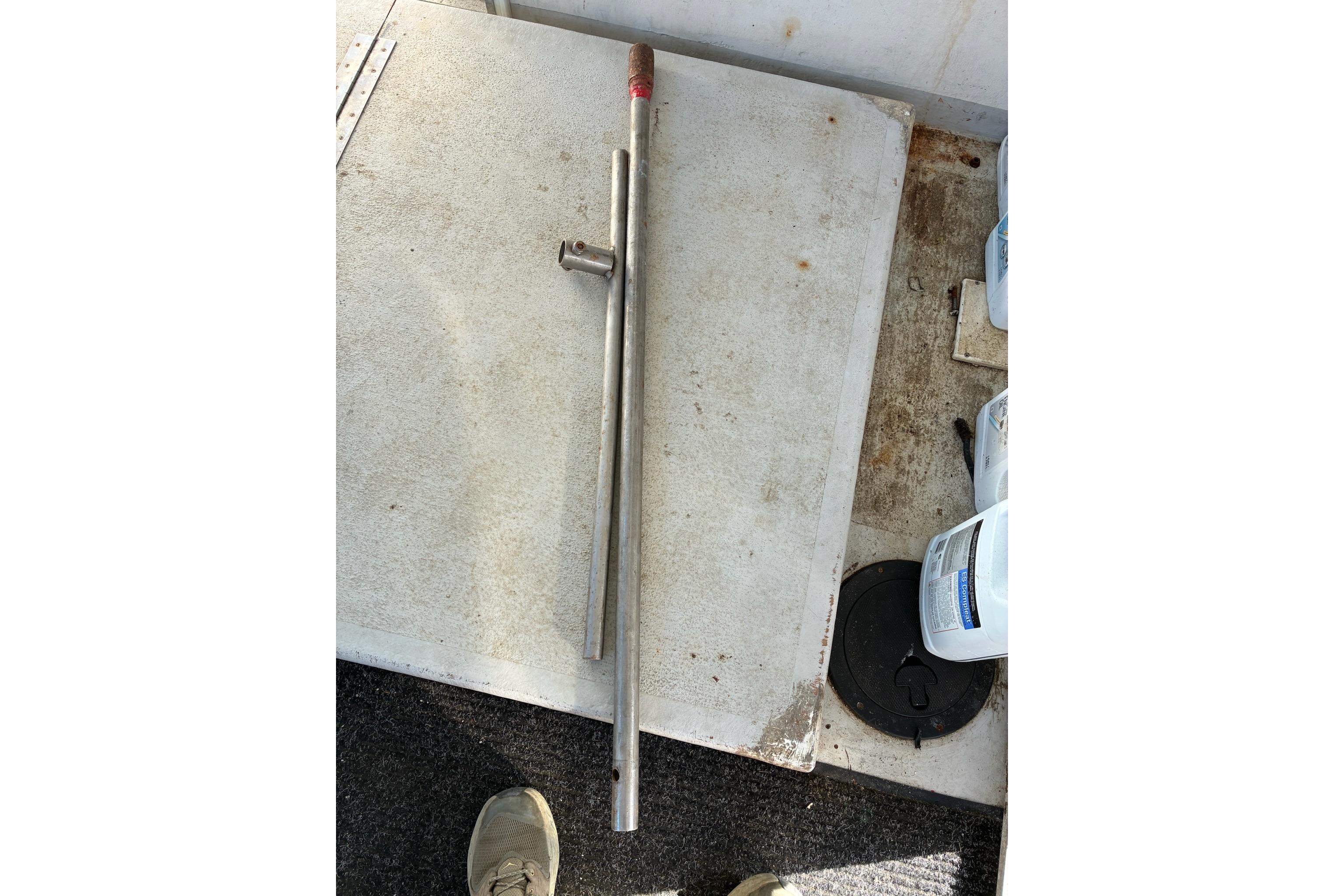 Metal rod on a boat deck, Calvin Beal COI PASSENGER, 2000 model.