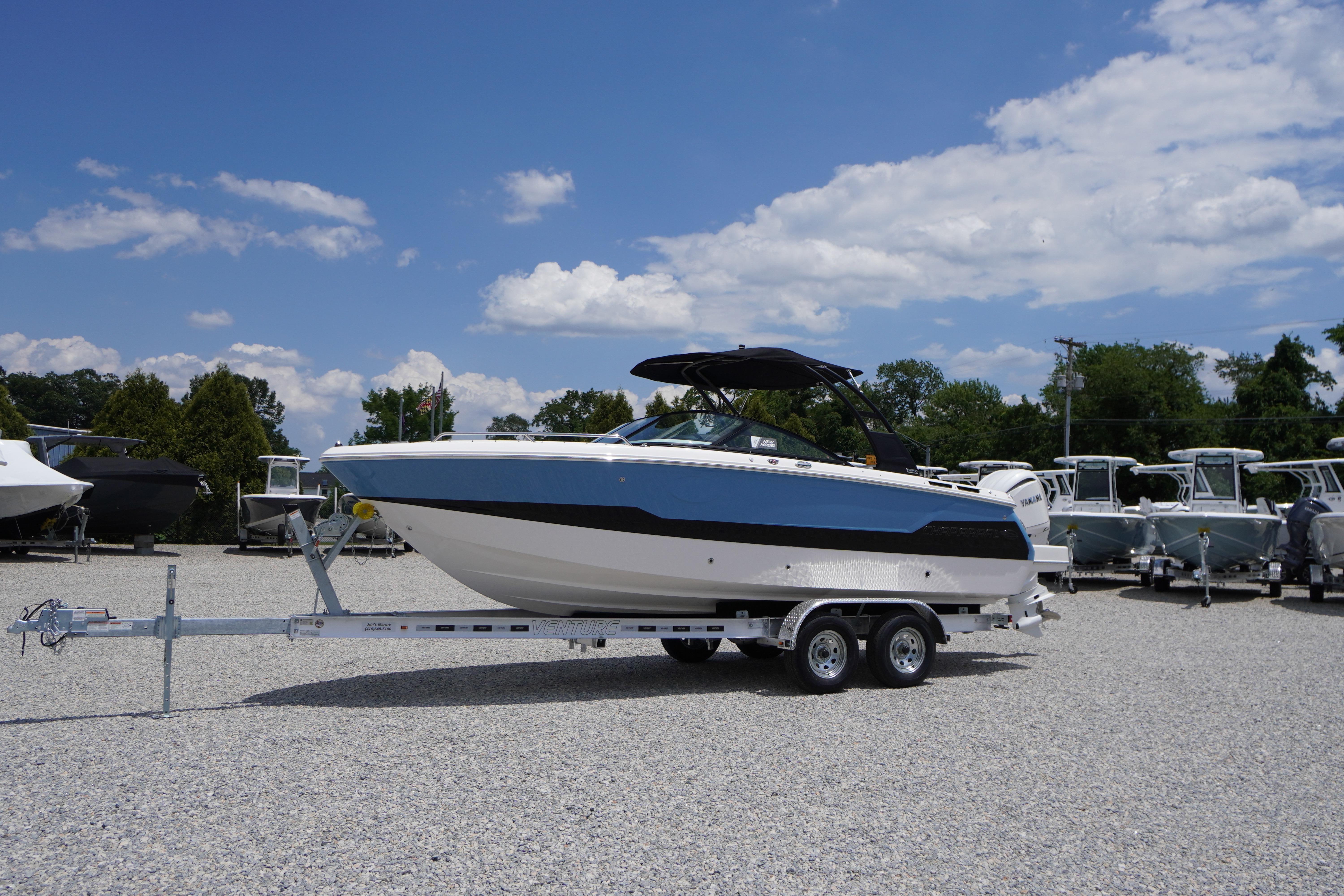 2026 Chaparral SSX 4 boat on trailer under clear blue sky.