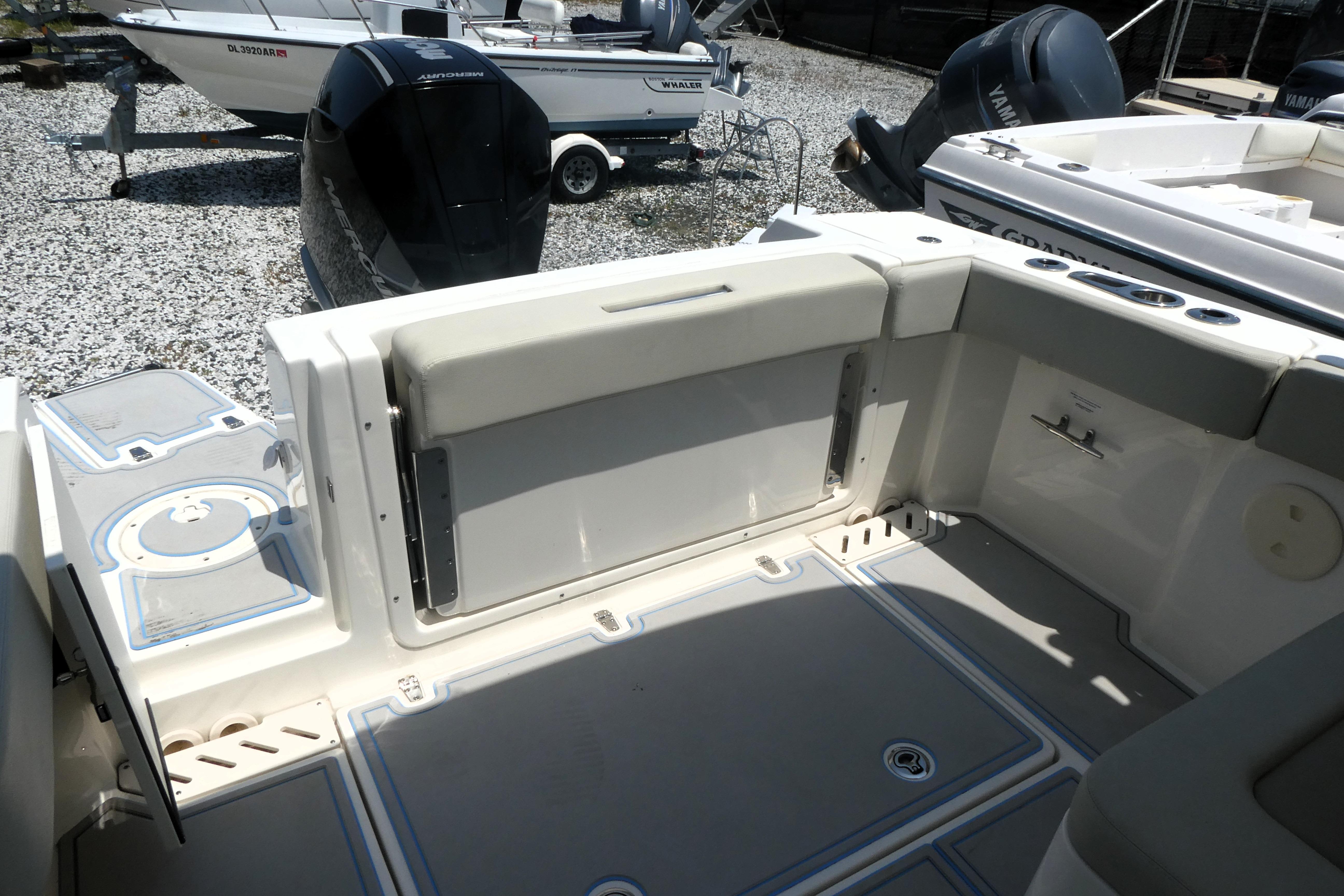 2022 Boston Whaler 240 Vantage boat interior with seating and storage features.