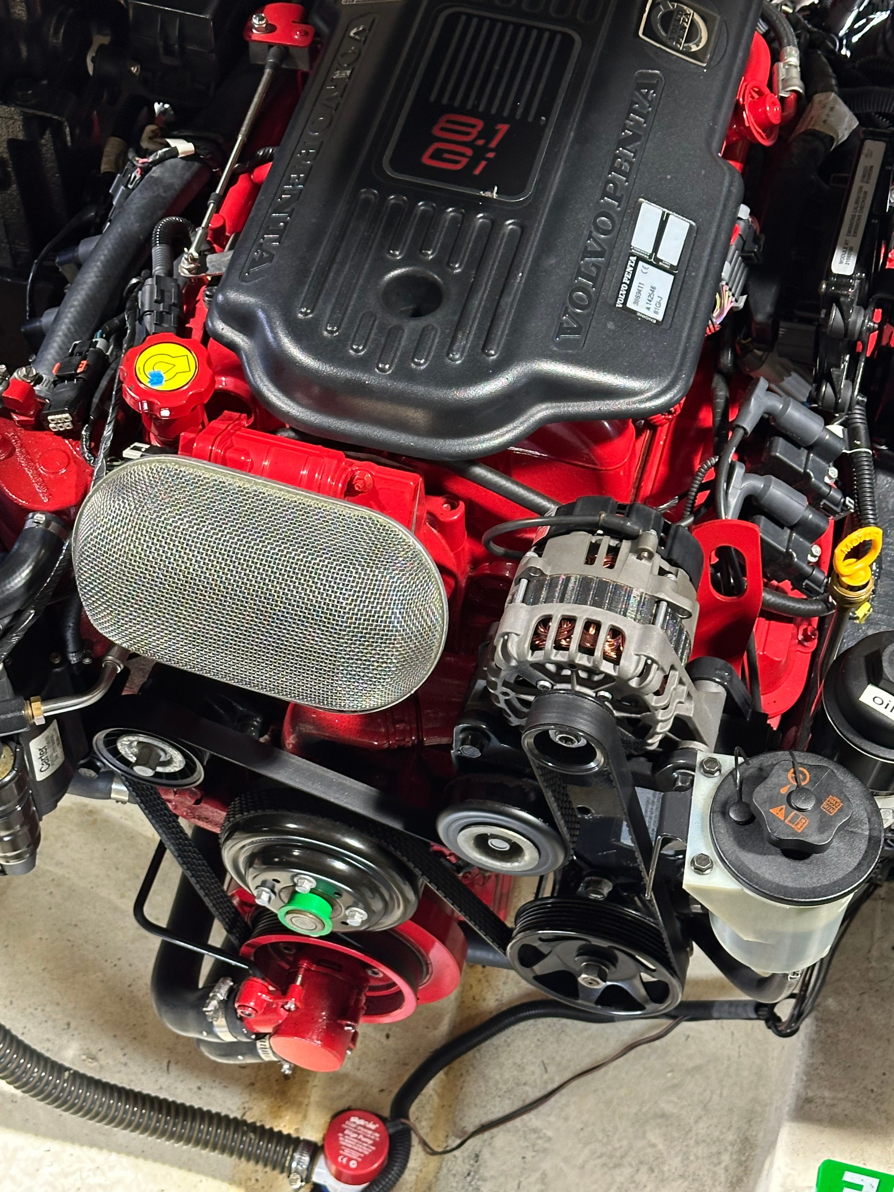 A powerful engine with red accents and various components is visible.