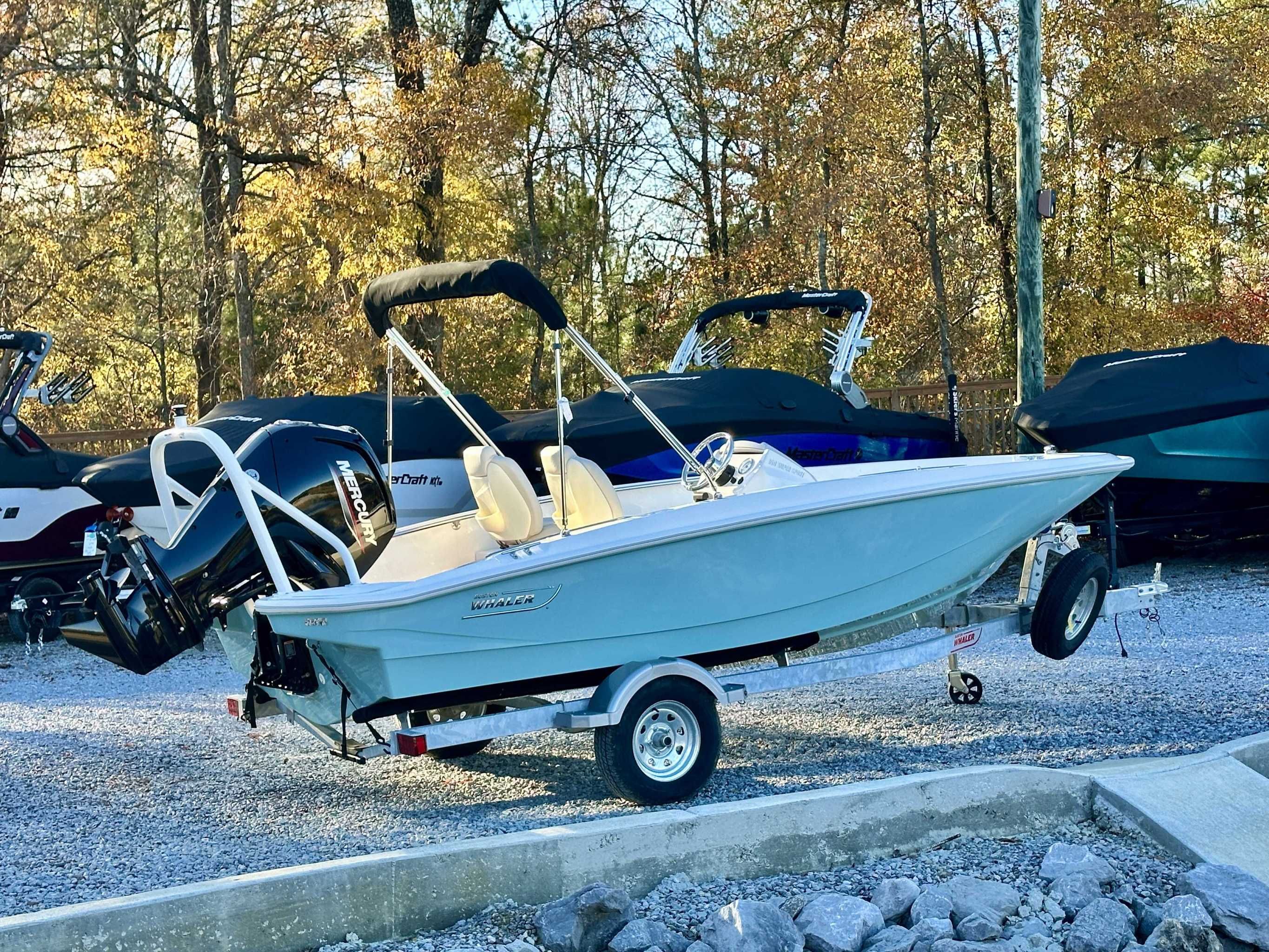 2025 Boston Whaler 160 Super Sport on trailer outdoors.