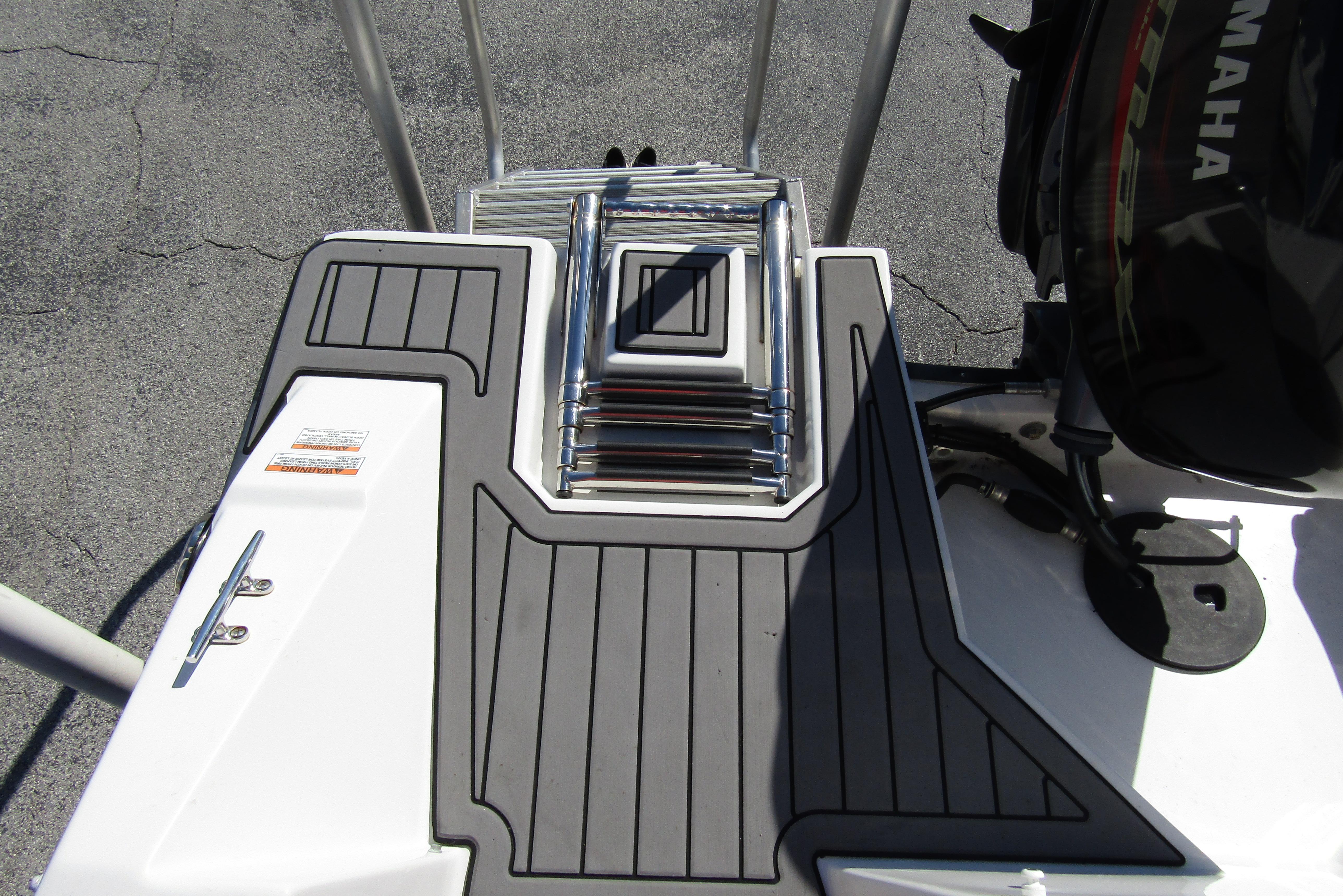 2021 Starcraft SVX 171 OB boat deck with ladder and Yamaha engine.
