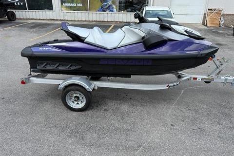 2025 Sea-Doo GTI SE 130 jet ski on trailer, parked in a lot.
