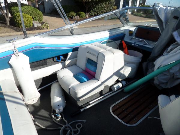 1992 Rinker Captiva 170 OB boat interior with white and blue seating.