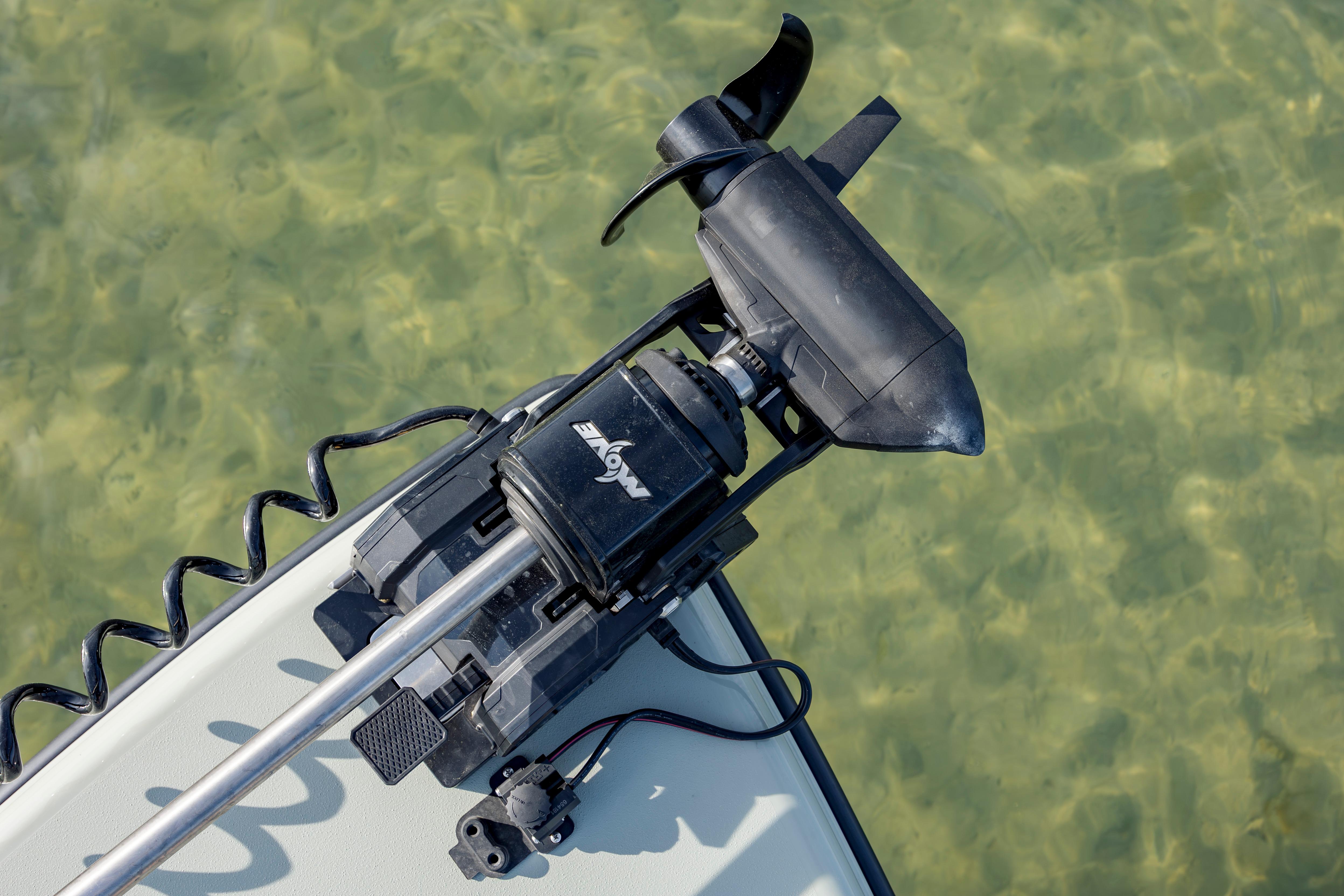 Electric boat motor on clear water, Vtech model 18, year 2025.