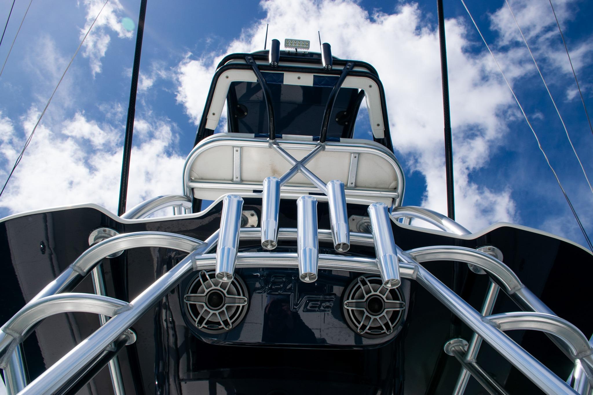 2022 SeaVee 390Z boat with stainless steel features against a blue sky.