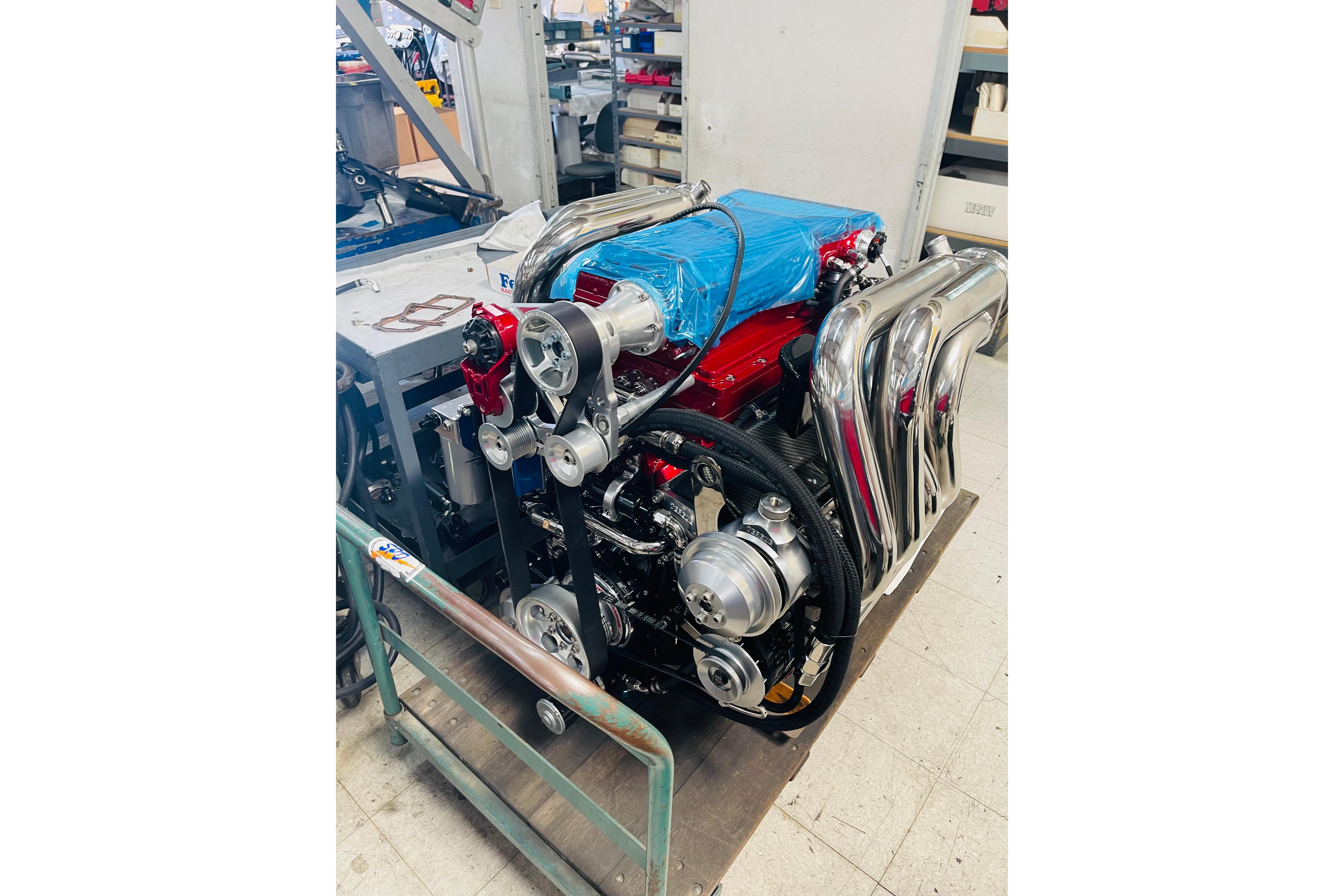 High-performance engine of a 2013 Nordic 39 POKER RUN boat in a workshop setting.