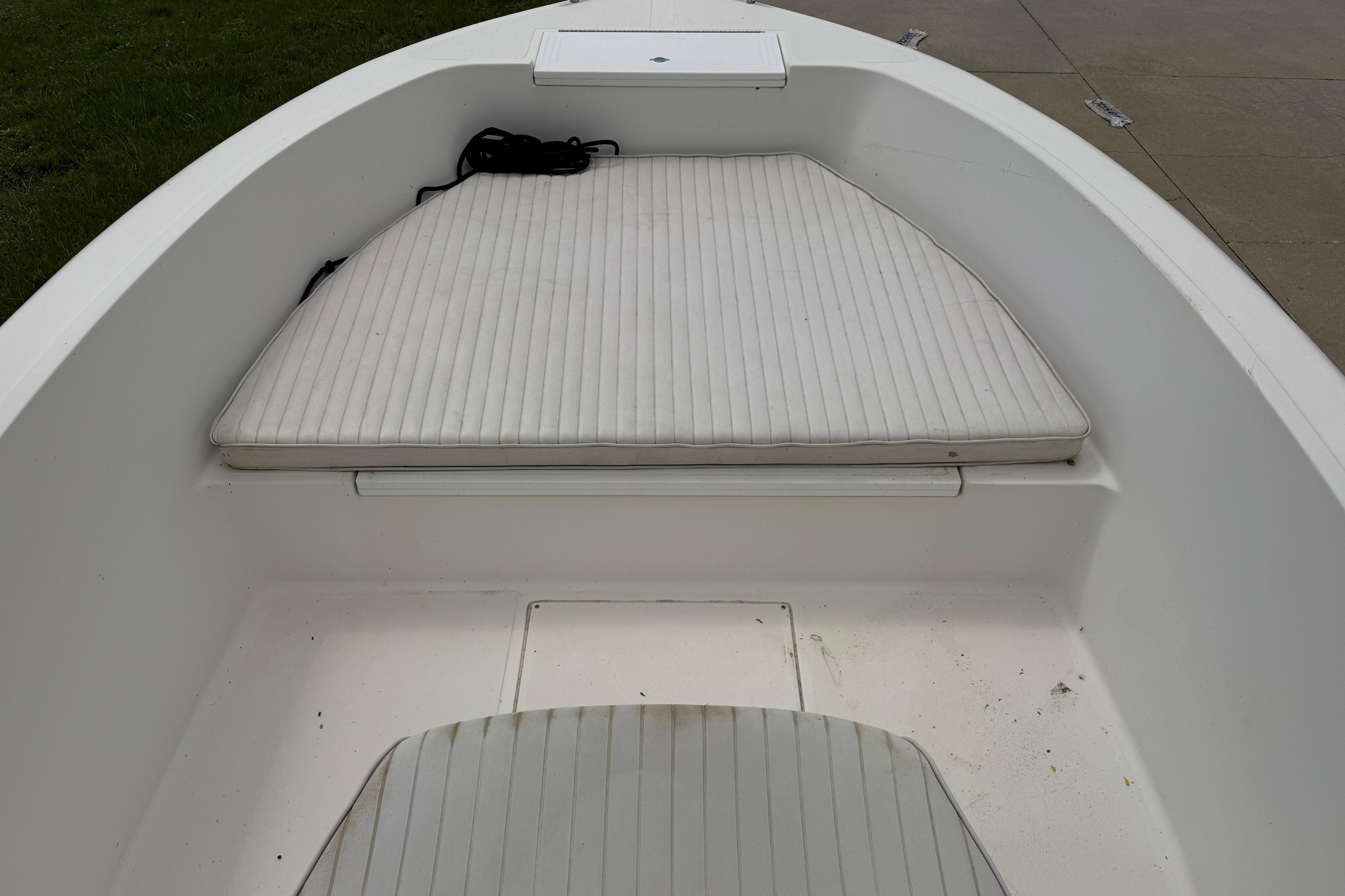 2012 Clearwater 2000 Center Console boat interior with cushioned seating and storage.