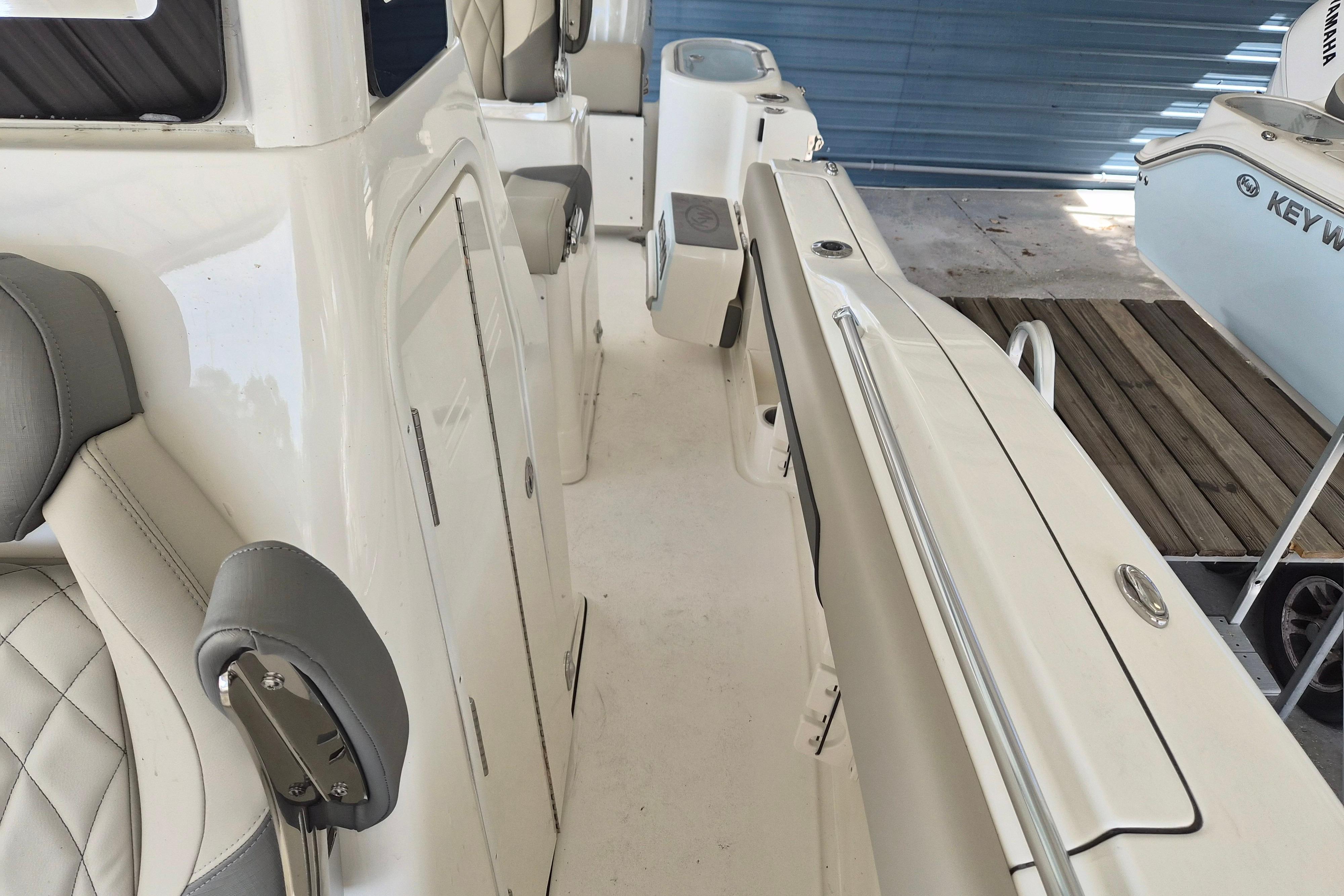 2026 Key West 260 Center Console boat interior with seating and storage compartments.