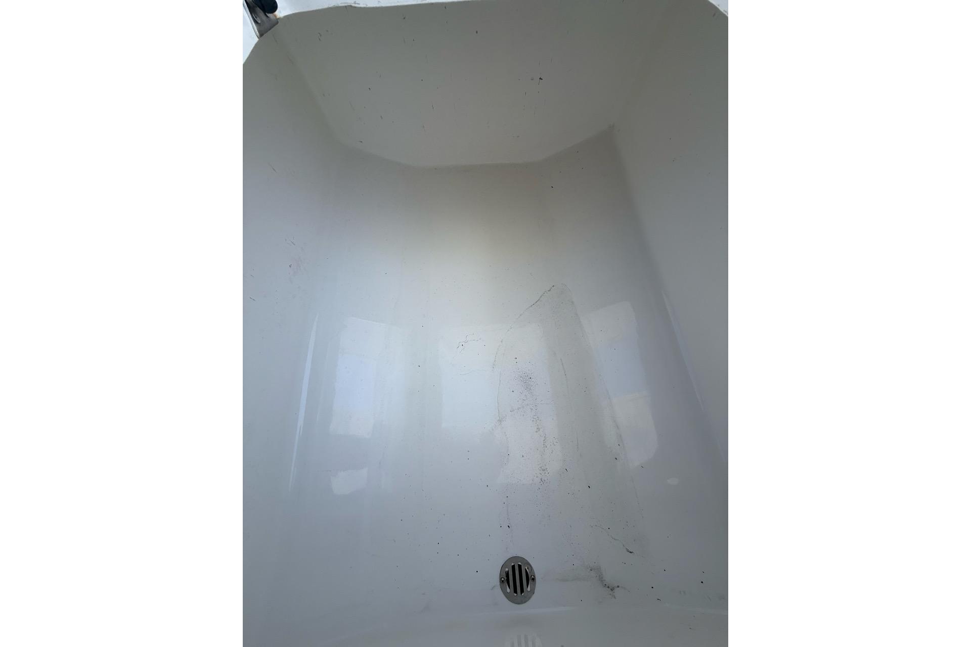 Interior view of a Custom Infusion 34 CC boat, 2021 model, showing a clean white surface.