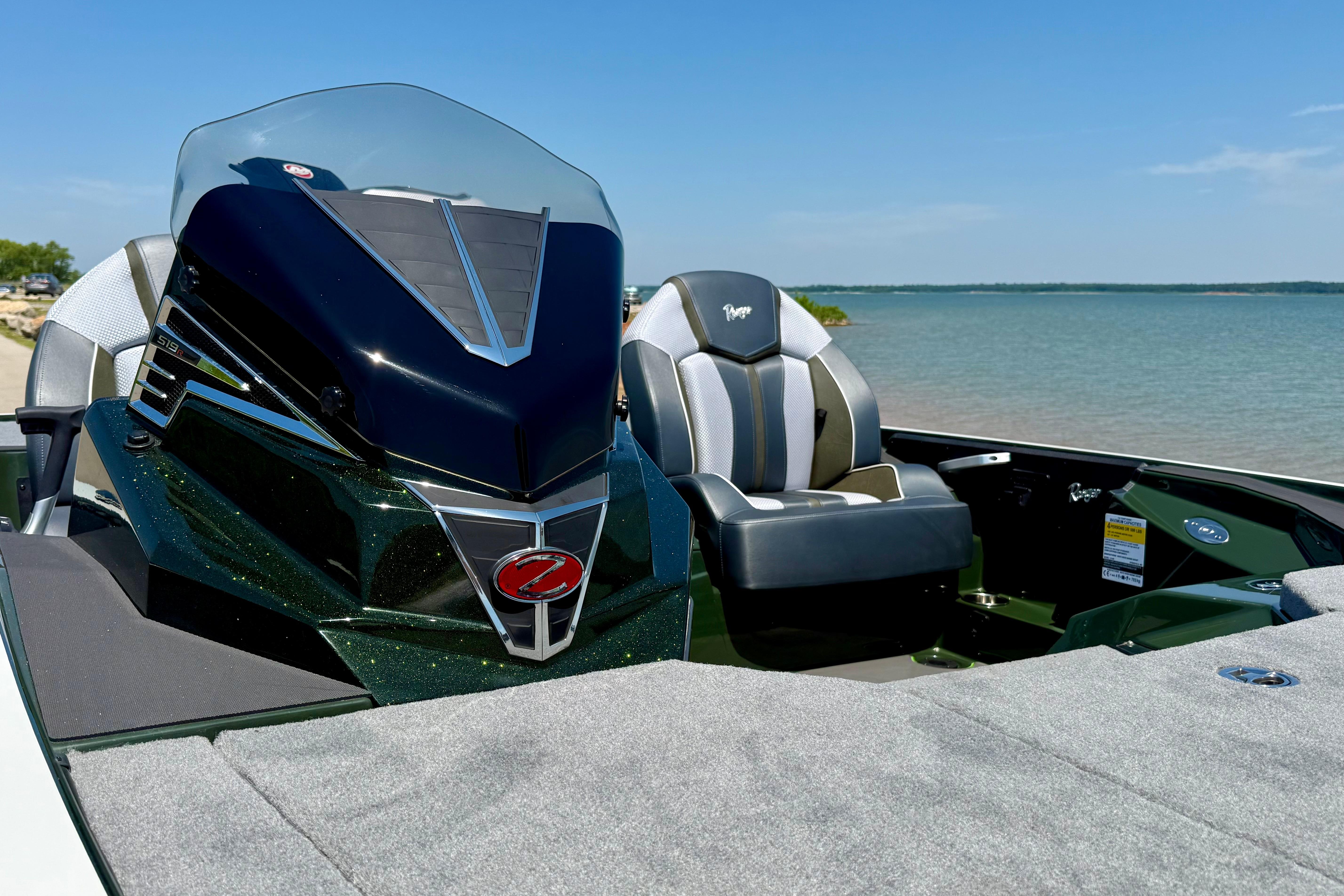 2026 Ranger Z519R boat interior with sleek design, featuring a comfortable seat by the water.