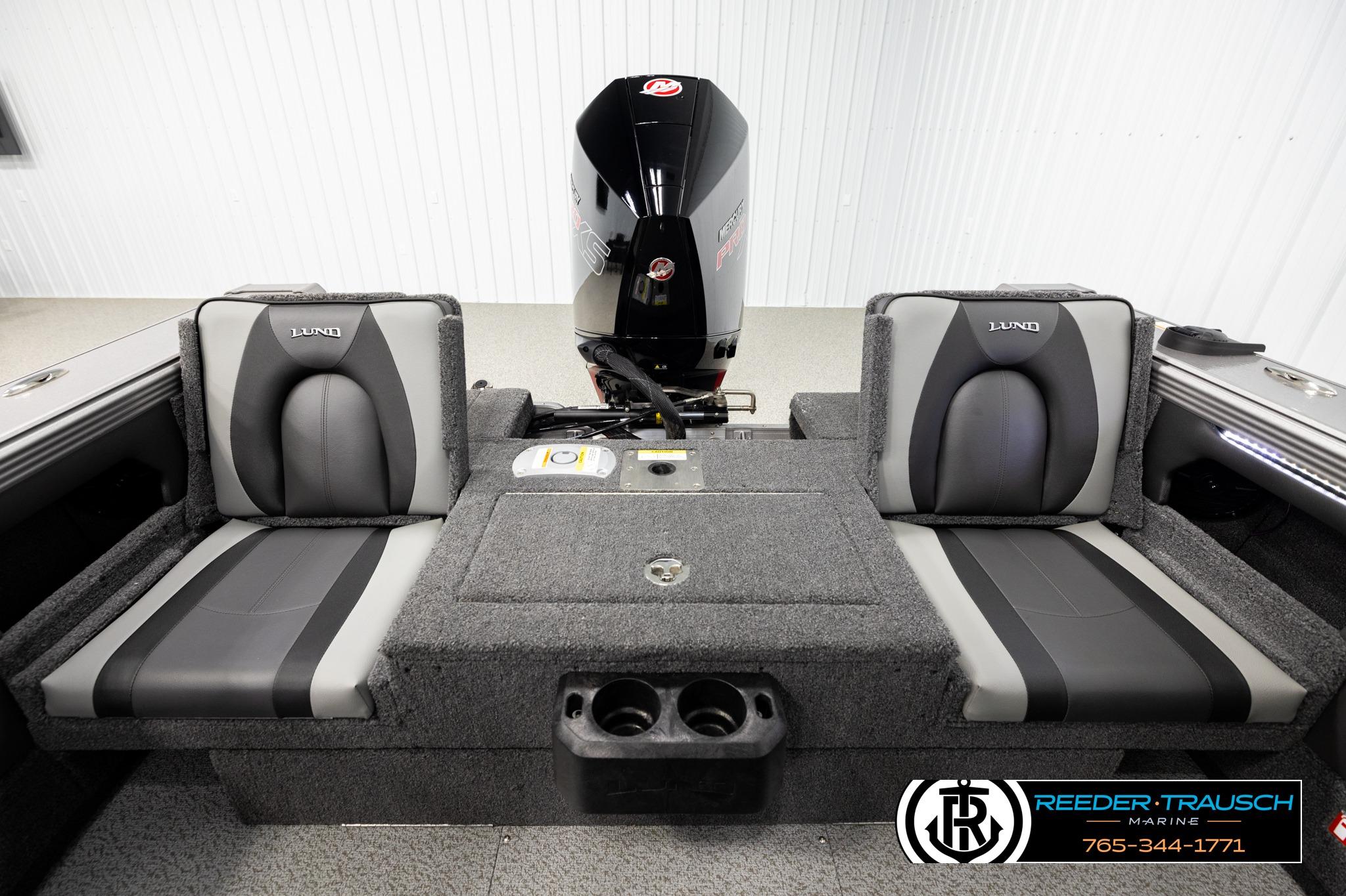Interior of 2026 Lund 1975 Tyee boat with dual seats and motor, by Reeder-Trausch Marine.