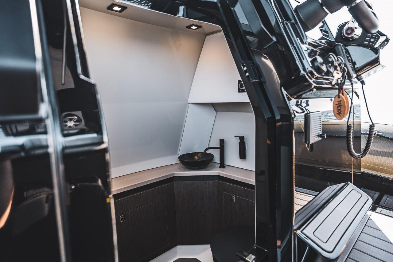Luxurious interior of 2026 G-Tender DIECI yacht with modern kitchen design.