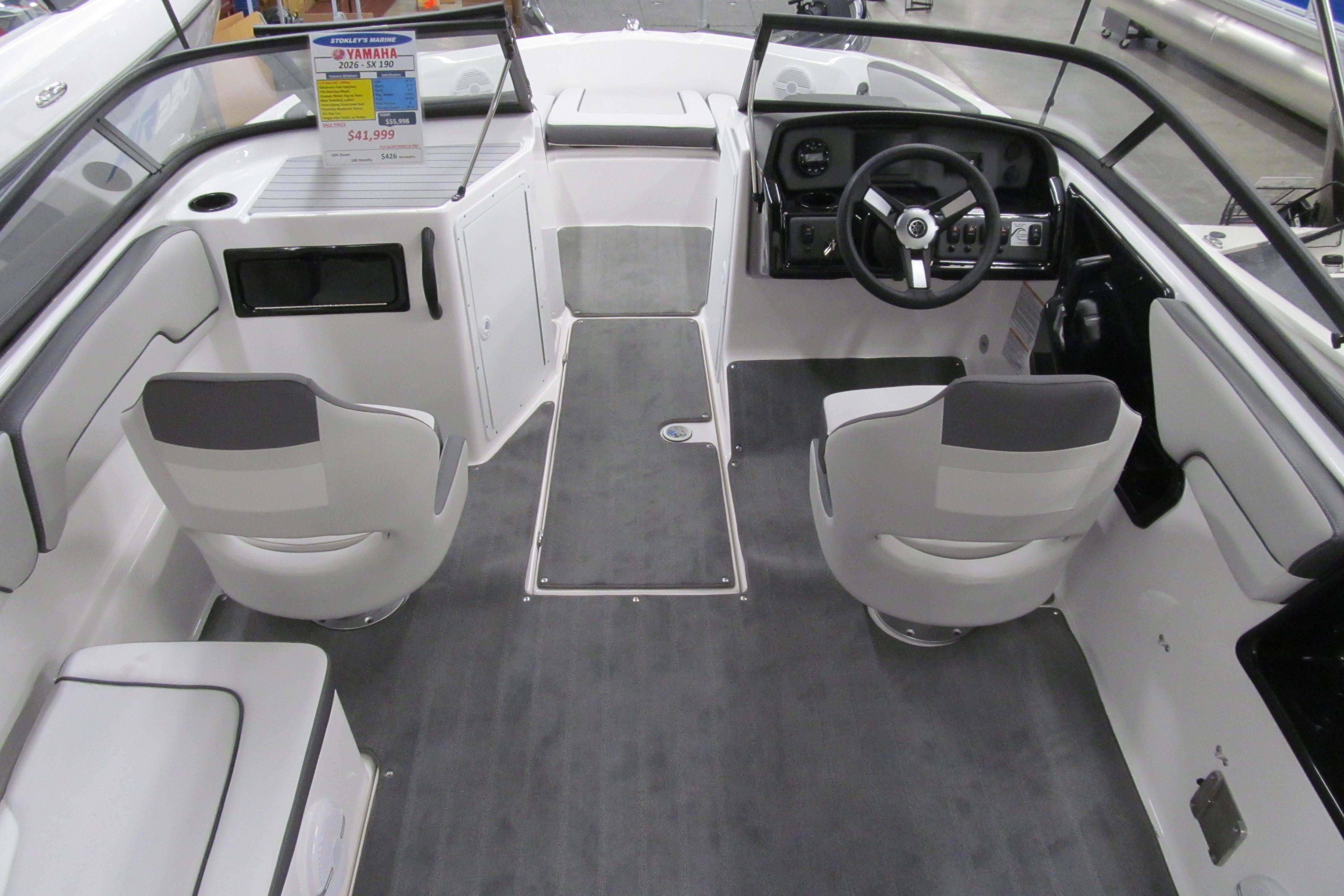 2026 Yamaha Boats SX190 interior with modern seating and dashboard design.