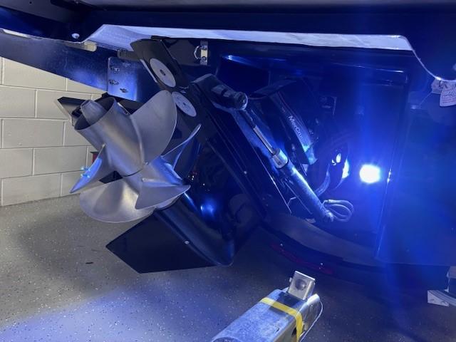 2026 Chaparral SSX 6 boat propeller with blue LED lighting in a garage setting.