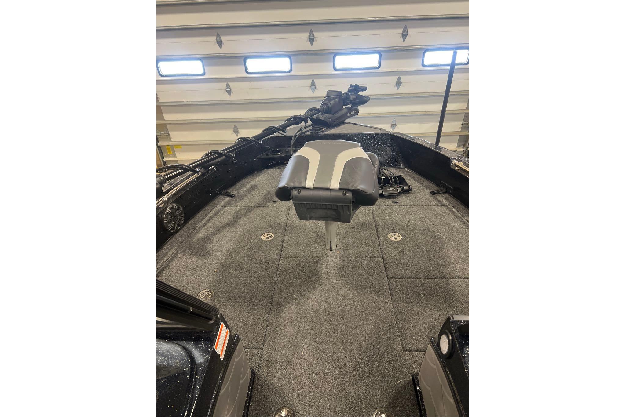 2026 Nitro ZV20 Pro boat interior with gray carpet and adjustable seat.