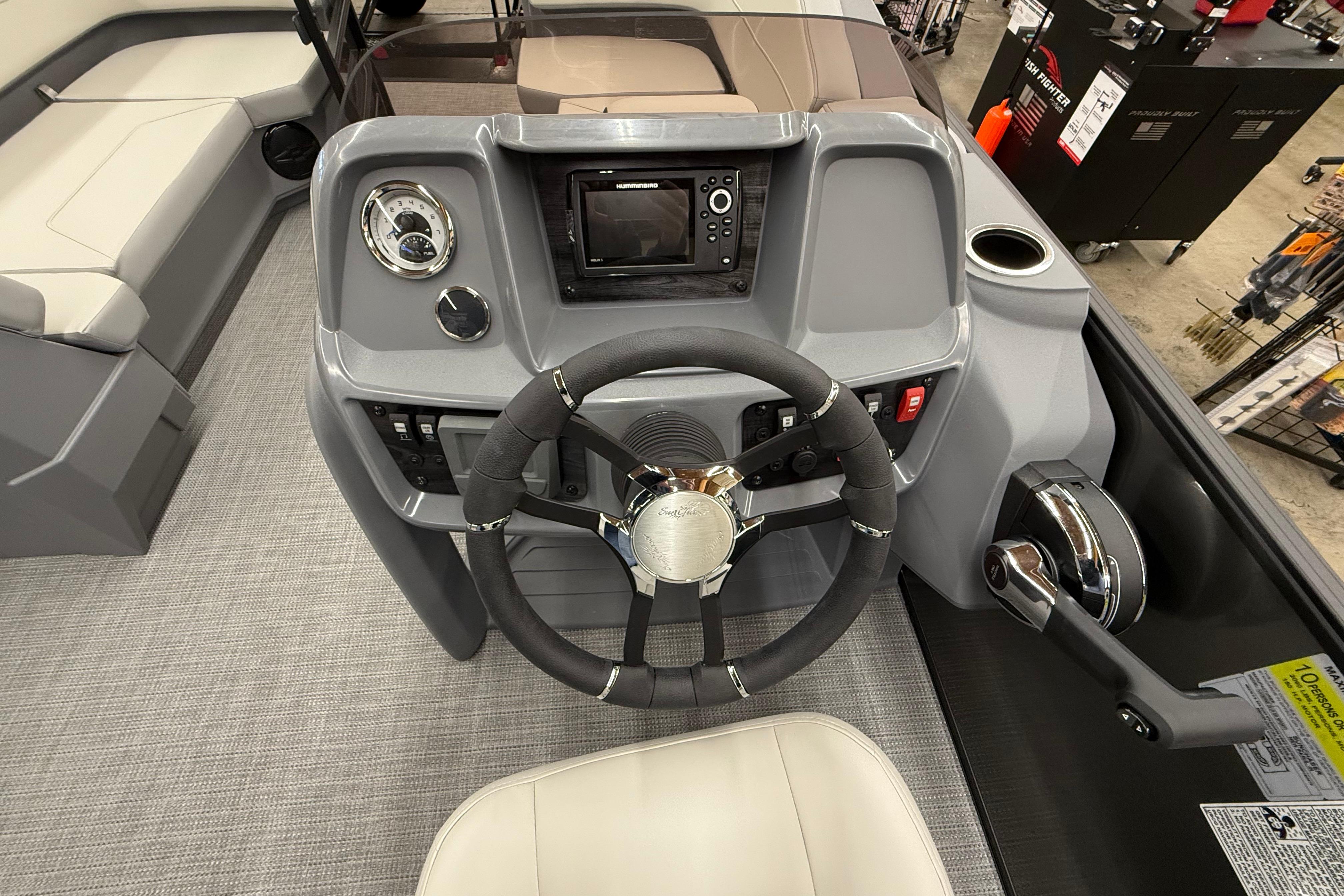 Steering console of 2025 SunChaser Lucerne 22 LR DH pontoon boat with modern controls.