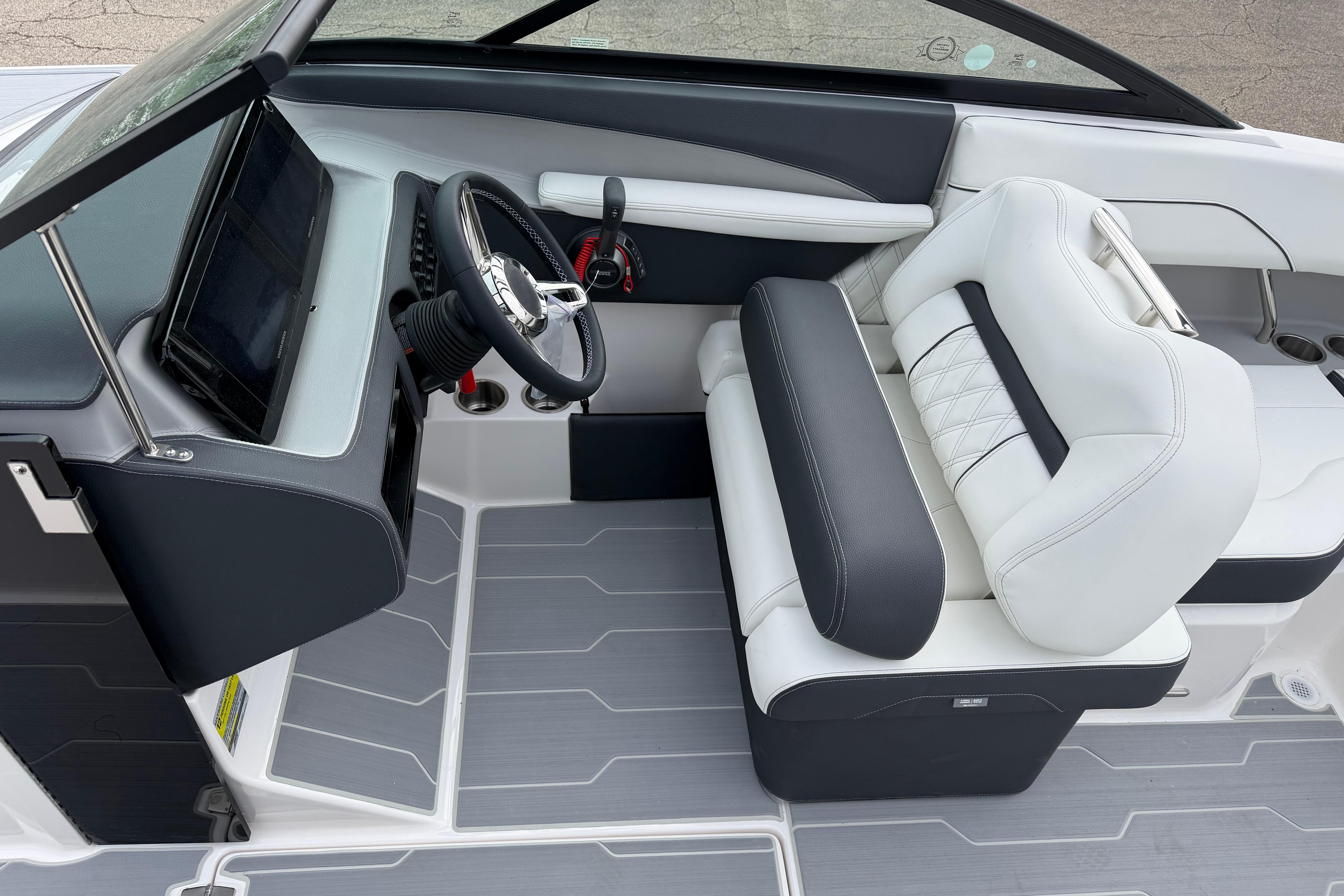 2026 Regal LS2 Surf boat interior with modern steering and luxurious seating.