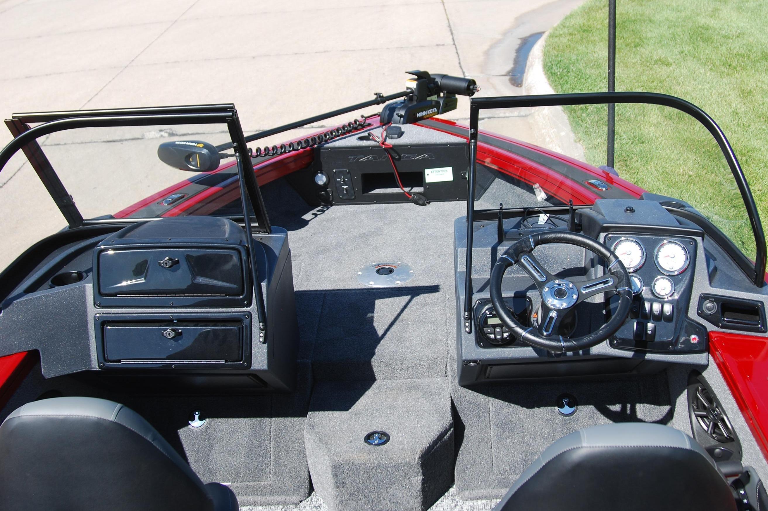 Interior view of 2026 Tracker Targa V-18 WT boat, featuring steering console and dashboard.